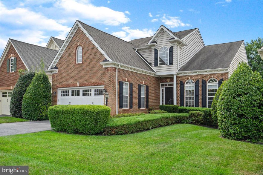 This beautiful home in the stunning community of Bulle Rock golf course has everything you need. Enter the community through the gated entrance and tour the meticulously maintained grounds. The neighborhood includes a golf course, club house, pool and many other community amenities. This home features countless builder upgrades! Some of these will include the plantation shutters and custom plantation slider to back door, retractable awning that spans across the beautiful wood composite deck, ac first floor master bedroom with Tre ceiling, walk in closet, exquisite quartz counter-tops and Spanish porcelain tile flooring complete with Jacuzzi tub.  The fully finished basement comes with its own wet bar complete with mini fridge and dishwasher. Watch TV and entertain on the included projection screen system.