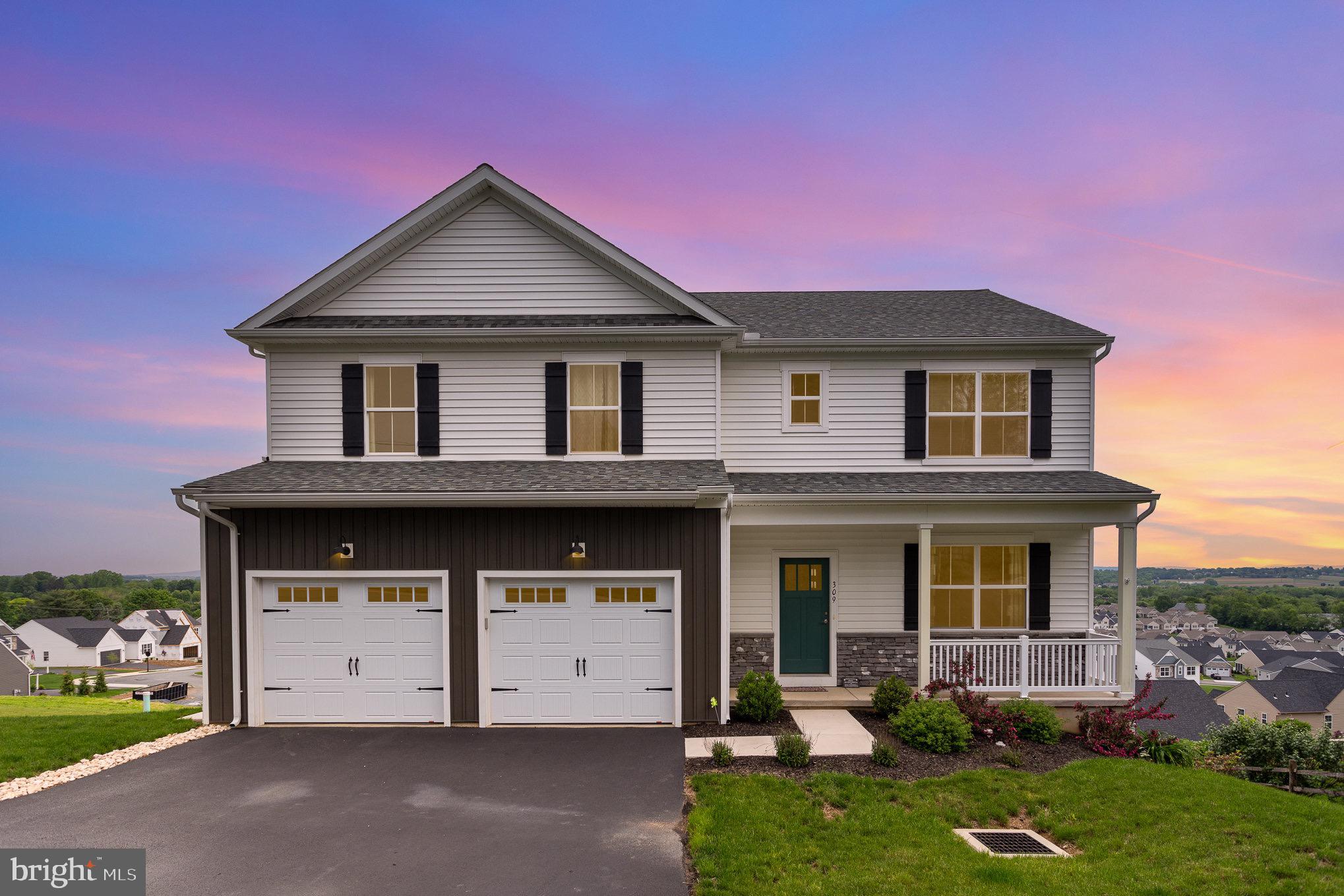 Nestled in the highly sought-after Warwick School District, this stunning home offers breathtaking views that stretch for miles—and yes, you can enjoy the July 4th fireworks right from the comfort of your own deck! Just two years young, this thoughtfully designed home features an open floor plan with lots of natural light, creating a bright and airy feel. The first floor includes a dedicated office space, a spacious mudroom perfect for organizing daily essentials, and a convenient laundry room just off the kitchen. The kitchen itself is a chef’s dream, boasting a large island, granite countertops, two pantry closets, and abundant storage. Relax in the cozy living room with a natural gas fireplace or soak in the panoramic views from the sunroom.
Upstairs, the expansive primary suite includes a luxurious bathroom and a walk-in closet. You'll also find a versatile loft or flex space, three generously sized bedrooms—each with its own walk-in closet—and a full bathroom. The enormous walk-out daylight basement is ready for your personal touch, offering endless possibilities for additional living space. This home truly combines comfort, functionality, and scenic beauty in one perfect package. Just minutes from downtown Lititz, walk to your favorite shops and restaurants!