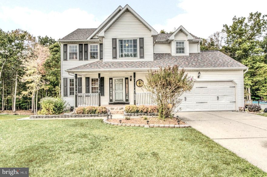 Welcome home to this Porch front home in  Abingdon Reserve.  3740 Federal Lane is a  4 bedroom, 3.5 bathroom home with a 2 car garage will give you over 2,700 sq ft of generous living space. Relax on the deck or walk out to the rear patio from the fully finished basement with a wet bar. The updated kitchen is great for entertaining guests with its open view into the cathedral ceiling family room. New Roof installed w/ 40 YEAR WARRANTY  and Water Heater in 2020... Triple pane windows/ sliding glass doors basement and kitchen with noise reduction with transferable warranty 2013, Kitchen appliances 2016 and 2018.