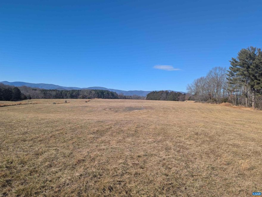 Unobstructed Mountain and Pastoral views will be yours year round. 2.5 miles from Rt 29, 13 minutes to Hollymead Town Center. State Road frontage and No HOA. 4 bed conventional  Drain field already permitted. Well Drilled in May 2025, 400ft deep, 10 GPM yield. Owner is a Class A Builder so a custom home package is also available on this lot. Established area of quality homes. Power onsite. Owner/Agent.
