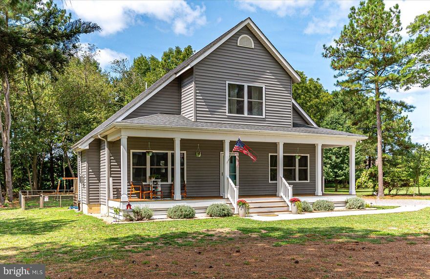 This beautiful home is now back on the market due to a previous contract falling through, offering a fresh chance to make it yours! Step into this charming three bedroom, two and a half bath,  two car garage, cape cod home tucked off Powellville Road sitting on a 1.3 acre lot. This home was built in 2017, has luxury vinyl plank flooring throughout the first floor, tiled bathrooms, oak staircase, and carpeted bedrooms on the second floor. Designed for open floor plan living, the first floor offers a spacious living room with an electric fireplace, open kitchen with a four top bar, and a dining area, and a spacious laundry room. Master bedroom with windows facing the front yard catch the morning sun. As you walk up the oak staircase, you'll find a nice flex area at the top of the steps perfect for a desk or small couch, flanked by two spacious bedrooms with a hall bathroom. The back porch offers plenty of place for family gatherings, and a nice vantage point over the entire backyard. The home also has a conditioned crawl space.  This home is a great opportunity for those that seek peace and quiet of country living. Seller requests 24 hour notice before showings.