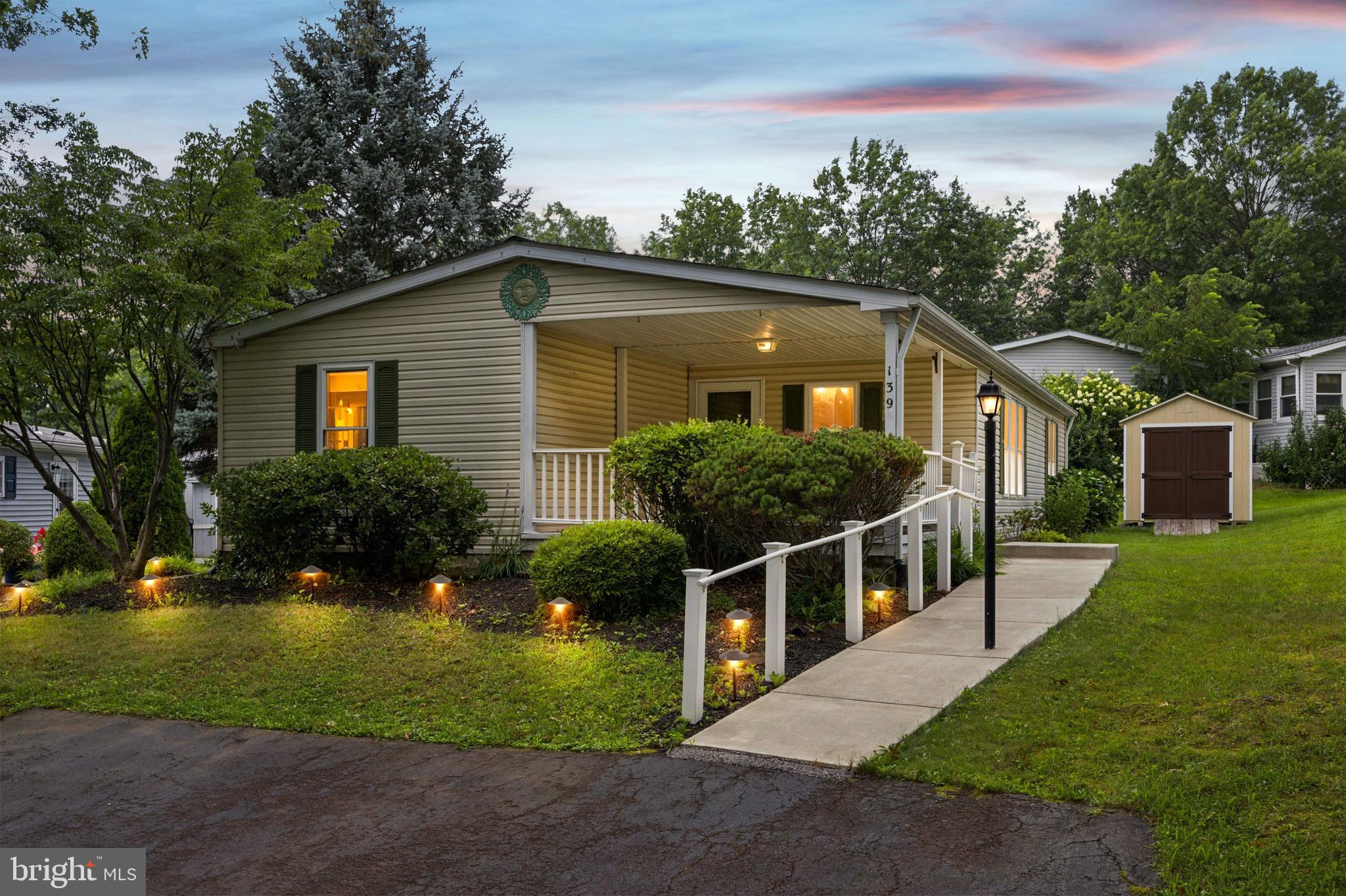 Enjoy easy, low-maintenance living in this friendly Community with nature's beautiful display of grassy meadows with wildflowers, tall shady trees newly paved quaint walking path, pond with fountain, gazebo & Club House, a wonderful gathering place for socializing and recreation, you’ll find this quaint home in the sought after Hidden Springs 55+ community offering an ideal blend of comfort and convenience making it a true haven for those seeking a peaceful yet active lifestyle. As you approach this residence, you are greeted by a new concrete walkway to a roomy covered front porch that invites you to relax, enjoy a good book & engage with friendly neighbors. Enter the home to the great room w/vaulted ceilings & triple windows illuminating the room with lots of natural light. This home features all walls that have been skim coated to eliminate grooves between the panels giving off the effect of having a fresh drywall look found throughout the home in addition to 5” baseboard moldings and recently installed attractive water-resistant laminate flooring (2023), found throughout most of the home! An open floor plan seamlessly connects the great room, kitchen & breakfast room perfect for hosting family gatherings. Kitchen also boasting vaulted ceilings, a double stainless sink with GD, a new smooth electric cooktop with vented range hood, an attractive backsplash, convenient center island a space for your culinary creativity & chair rail moldings that travel down both halls and into the guest bedroom w/double door closet space & two windows. Just off the kitchen is entry to a generously sized Laundry Room w/washer & dryer offering a bonus storage area with a shelving unit and wall cabinetry, an abundance of counter space and convenient outside access to the side yard. Also, a handy shelved storage closet perfect for a pantry, which is adjacent to the kitchen! Across the hall you’ll find the Main bedroom highlighted by an attractive walk-in closet with California style shelving that connects to a 4-piece ensuite bath with garden tub and stall shower including a linen closet & ceiling fan. At the opposite end of the hall is a secondary guest Bedroom (den/study/office) & a hall bath with its own linen closet offering convenience, ensuring that both you and your guests enjoy comfort & privacy. Plus, the home offers updated window treatments, including top or bottom adjustable pleated shades and Roman shades, the entire home has been freshly painted with an attractive neutral color palette, also a brand new 8’ x 12’ shed (2024) located on rear of the property. Meander down the nearby quaint walking path to explore the natural beauty of the area - a serene, park-like setting of woods to enjoy the wildlife, tranquility and quiet with only sounds of chirping birds. The community clubhouse offers an outdoor spa & pool promising endless hours of enjoyment under the sun. For those who seek intellectual & social stimulation, the community library & meeting rooms are perfect venues for expanding your horizons & connecting with neighbors. The picnic area, game room w/pool table & exercise room complete w/weights, bikes, & treadmill cater to all your leisure & fitness needs, ensuring that every day is filled with joy & vitality. Community perks include the Lamppost, a monthly publication including a calendar of all community events that take place in and around the community which include such popular events as the Fall Community Pig Roast, Community Yard Sale, Summer Pool Party and seasonal weekend farm stands offering fresh produce, baked goods & homemade soups. Souderton's small-town charm awaits, with its quaint streets and local shops offering a plethora of dining, shopping, and entertainment options. Just a short drive to Peace Valley Park, Doylestown, and Montgomeryville Mall. Plus, with easy access to route 309 & PA Turnpike. Embrace the ease of one-floor living & enjoy a lifestyle that balances relaxation with recreation!