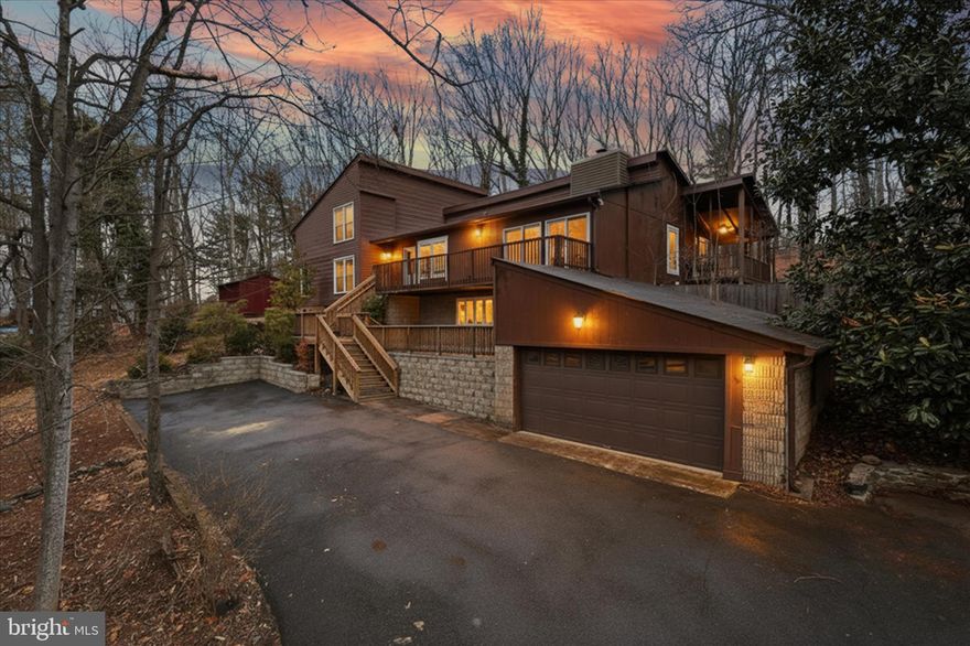 Welcome to 5196 Jackson Ct, a beautifully updated home offering over 2,900 sq ft of thoughtfully designed living space in a peaceful, wooded setting. This spacious residence features 5 bedrooms and 3 full baths, combining comfort, style, and functionality.

The main level was completely renovated in 2023 and showcases new LVP flooring, brand-new windows and sliding glass doors, and updated bathrooms. The kitchen is a standout with premium Monogram appliances, including a gas range with dual ovens and griddle. The hot water heater was replaced within the past five years.

The fully renovated lower-level suite is completely separate and includes its own entrance, kitchen, bedroom, laundry room, and walk-out patio — currently generating $1,900 per month in rental income.

With two separate driveways, ample parking, and a tranquil setting in desirable Vint Hill, this home offers versatility, privacy, and convenience all in one. Don’t miss this exceptional opportunity!