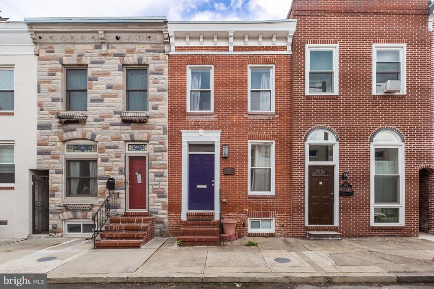 Upscale renovation in prime Canton location.  Steps from the water and tons of shops and restaurants.  Large kitchen with granite and stainless, main level powder room, trex roof deck, large master bath with soaking tub and marble vanity. Charming original wood staircase, main level laundry, and basement area for storage, rear patio perfect for a grill.  Easy parking on the street. Reduced $10K!