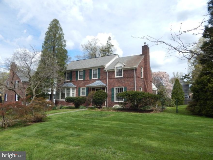Fantastic price for this solid brick colonial in Wyndmoor. This home has all of the character and charm of you could ask for. Lots of over sized window, flood this home with natural light. Hardwood floors. Colonial Wood Doors. Crown Molding through 1st & 2nd Floor. The entry foyer is a great size and offers a closet & powder room.  Large Living room featuring wood burning fireplace with colonial wood surround and stone hearth, french doors to outdoor patio. Great size dining room offers two built in corner cabinets& a beautiful picture window. The kitchen offer good cabinet space as well as a desk/ breakfast area. There is also a separate office rounding off the first floor. The upstairs feels just as open as downstairs The master bedroom features a vaulted ceiling making this already large room feel open and airy. There are two other good size bedrooms and one smaller room. Hardwood under the carpets. 2 full baths and a linen closet finish off the second floor. There is also a large 2 car attached garage. Laundry room and a separate utility/ gardening room. Enjoy the back covered patio overlooking a serene back yard. All of this within walking distance to downtown Wyndmoors restaurants, shopping, park & lovely walk-able neighborhoods. Reasonable offers will be considered.