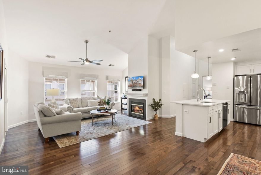 "4-3-2-1-PENTHOUSE!" - 4 BEDROOMS, 3 FULL-BATHS, 2 LEVELS, 1-CAR GARAGE, 17' SOARING VAULTED CEILING, BRIGHT, SOUTH-FACING, SUNLIT, TRI-SUITE PENTHOUSE W/LOFT SUITE, PLUS  A BALCONY!! 

Stunning, Turnkey/Ready-To-Go, Sunlit, Bright & Updated "Greebrier Loft" Model Tri-Suite Condo Unit in the MIDDLE OF EVERYTHING you need to crush Suburban Life!  Mere minutes to
Whole Foods, Wegman's, Costco, Safeway, Great Wall Supermarket, Halalway International Supermarket, Lowes, Walmart Supercenter, Fair Oaks Mall, LA Fitness, Tatte, Tea Do Fairfax, Haraz Coffee House, Honor Brewing Company, BBQ21, Burlington Coat Factory, Public Storage (but who needs it when you have your own PRIVATE GARAGE in your condo building??!!), Nordstrom Rack, Quick Lane Full-Service Automative Repair Shop, Wendy's, Jermantown Animal Hospital, How Cute Dog Grooming, Sushi Friends Hashi, Flower-N-Florist, Bakery Bread & Grill, Sugar Mama's Ice Cream, Green Basil Dimsum & Pho, Buffalo Wild Wings, Wingstop, Little Peru Pervian-Style Chicken, Dulce Crepes, Cinemark Fairfax Corner and XD Theaters, REI...and that's just scratching the surface!      

This unit has the location, the space, and the upgrades where you can LIVE and LOVE life! Beautiful Stainless Steel Appliances - French Door Fridge w/In-Door Ice & Water, Gorgeous Gas Stove, New Dishwasher, Stainless Steel Vent Hood, Immaculate Quartz Countertops, LOTS of Cabinet Space, Pantry, New Engineered Hardwood Floors THROUGHOUT, Newer Matching Washer/Dryer Set, HVAC has BRAND-NEW Compressor and Filter Dryer. Primary Suite delivers TWO walk-in closets. Gas Fireplace for creating warm, cozy moments with the flip of a switch! On-site pool to make the most of Summer. 2 PARKING SPACES - 1 in your interior ground-level garage + 1 driveway space (GARAGE #8). 

Well-maintained dedicated trash & recycling room on every floor. Building has a large elevator. Building, Unit, & Garage are all wheelchair-accessible, providing convenient access for multiple mobility levels and types. This home has been meticulously maintained. The photos speak for themselves and your in-person property tour will confirm how exceptional this specific home truly is.    

 *****Seller reserves the right to ratify an offer at any time with or without prior notice. ALL OFFERS DUE BY 5PM ON MONDAY, MAY 18, 2026.*****