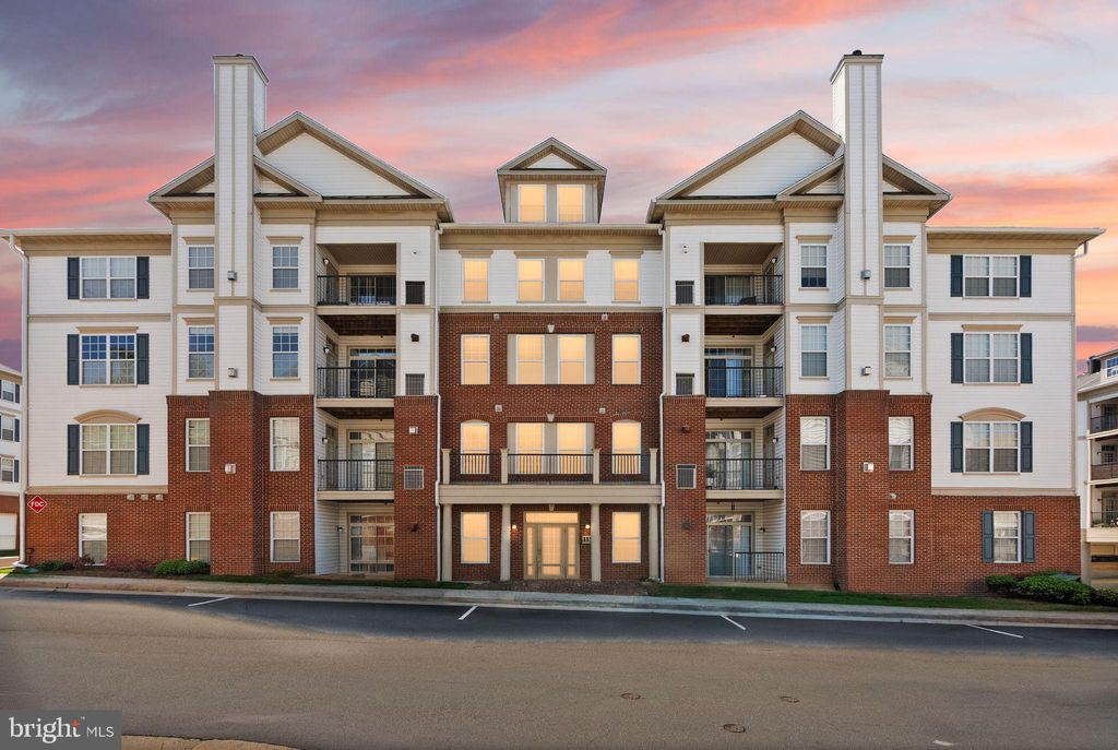 Photo of 11575 Cavalier Landing Court #403, FAIRFAX, VA 22030 (MLS # VAFX2311760)