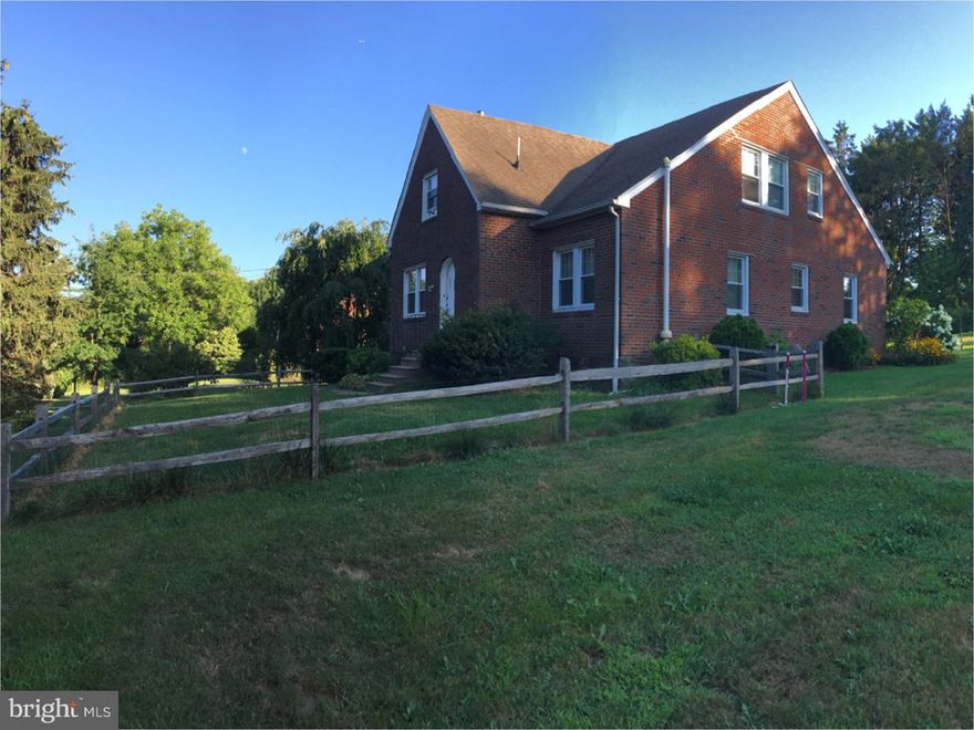 This Unique, all brick, Cape style home is set back from the road and sits on just under 3/4 of an acre. It's just down the street from the rebuilt MacDonald Elementary and William Tennent High Schools.  It includes an oversized detached two car garage (with electricity), newly replaced stone wall and a large shared driveway that was completely stripped and repaved in 2015.  The kitchen has been beautifully renovated to include cherry wood cabinets, high end granite countertops, and overlooks the dining room and living room with a working wood burning fireplace.  Two spacious bedrooms and a full bathroom round out the first floor.  Upstairs are two additional bedrooms, another full bathroom, and a recently remodeled spare room that is currently being used as an upstairs laundry and huge walk in closet.  A cedar closet and two large walk in attic spaces that have been professionally covered in radiant barrier to keep them temperate, finish the second floor. First and second floors have beautiful original hardwood floors. The basement runs the length of the house and was recently updated into a recreation room that includes a wet bar, additional laundry room, and several storage areas. The electric service in the house (200 amp) and the subpanel in the garage have been replaced in 2016. Every window in the house has been updated with energy efficient replacement vinyl windows.  The partial fenced in front yard (2014) is great for dog lovers, while the large backyard is great for barbeques and offers lots of privacy.  Come and see this home today!