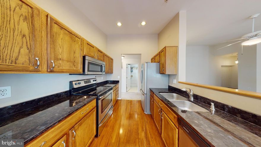 Welcome to your dream home at 7508 Snowpea Ct #L! This spacious 2-bedroom, 2-bathroom gem offers the perfect blend of comfort and convenience.  now available for rent at an incredible price of $1995 per month. Step into a generously sized living space, adorned with a large walk-in closet and an in-unit washer/dryer for your ultimate convenience.

The heart of this home is its open kitchen, complete with stainless steel appliances, seamlessly flowing into a bright and airy sunroom. Vaulted ceilings provide an added touch of elegance while offering stunning views of the surrounding trees. Natural light floods every corner, creating a warm and inviting atmosphere.

But the appeal doesn’t stop there. Imagine sipping your morning coffee on the balcony, soaking in the serene ambiance. This residence isn’t just a home; it’s a haven.

Location couldn’t be more perfect. Situated near the bustling Mt. Vernon Plaza shopping center along Rt 1, you have easy access to Costco, Walmart, Walgreens, and Home Depot – all just around the corner. Need to unwind? Take a dip in the community swimming pool or enjoy a leisurely stroll in the nearby parks.

As if it couldn’t get any better, this listing comes with 2 parking passes, ensuring your vehicles always have a secure spot.

But wait, there’s more! Experience the home virtually with our immersive 3-D tour. Explore every room, envision your life here, and fall in love with your new home at 7508 Snowpea Ct #L. Your dream home awaits!  Available for move in December 1, 2023; showings on Mondays thru Thursdays 6pm-7pm, by appointments only with 24 hr notice, there are 3D matterport models availalble.