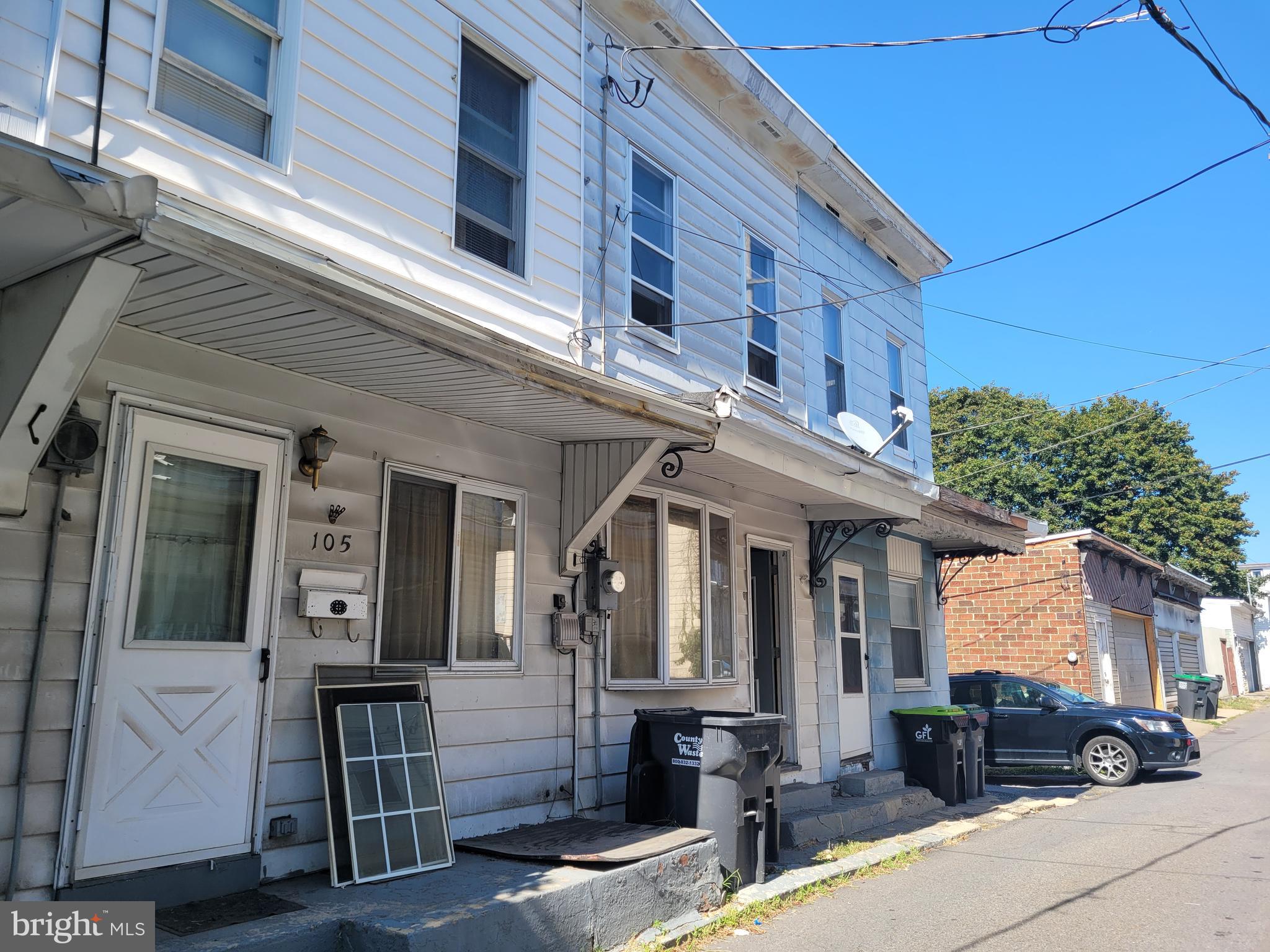 Two homes together, make them one or two. Both homes have two bedrooms, one bath each. Back porch is shared between the homes. Small yard is shared too. One heater for two homes, separate electric boxes. Homes do need work, homes sold as is.