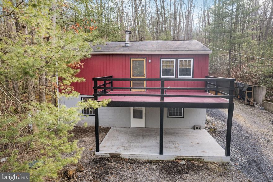 Welcome home to this meticulously maintained raised ranch offering the perfect getaway from the stress of everyday life. Nestled in the serene and peaceful location of Michaux State Forest, near hiking, biking and snowmobile trails, this is your opportunity to call this beautiful area home! Or use the home as a revenue-generating property, the ideal addition to your portfolio. This turn-key home boast tons of recent updates, including: new 50 year metal roof and insulation, new HVAC system, new gas stove and refrigerator, new well tank (2022), newer water heater (2020). Nothing to do but move-in or rent! You’ll love the cozy cabin feeling of the home, along with 2 fireplaces for those cold PA winter nights. Enjoy your morning coffee on the screened-in porch as the deer pass by. This home is situated on a 1.38 acre lot, providing plenty of privacy and nature at your doorstep. Large storage shed comes with the home. This home is a joy to own!