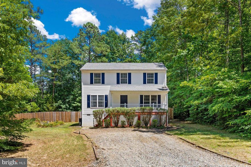 Constructed in 2004, recently updated and upgraded, this Ruther Glen Colonial at 188 John Paul Jones Drive offers three bedrooms, two baths, and one half-bath with nearly 1,700 square feet of living space. Lake Caroline boasts a 277-acre lake as its focal point and offers residents a plethora of amenities including sports courts, a swimming pool, clubhouse, marinas, sandy beaches, and around-the-clock security.

This property is located on a corner lot where John Paul Jones and Norfolk Drives intersect. Just steps away from the lake and recreation area, the home also features a completely wooded area across the street with a tranquil stream running through it. The yard is bordered by mature trees and a fenced in backyard for added privacy.

The main level features a spacious family room, living room, kitchen with granite countertops and stainless-steel appliances. A half bath and laundry room complete the lower level.

Upstairs are three bedrooms including the primary suite with an attached full bath. The home had its HVAC system replaced in 2015.

Surrounded by nature and recreational opportunities such as Legacy Park, Pendleton Golf Club, Sassafras Shade Vineyard, and Lake Anna just minutes away; this property offers convenient access to Ladysmith I-95 exit for commuters to Richmond or Fredericksburg within approximately 35 minutes’ drive. This inviting colonial at 188 John Paul Jones Drive awaits its new owner to make it their own – schedule your showing today!

Seller offering seller financing ( must see home first before discussing terms)