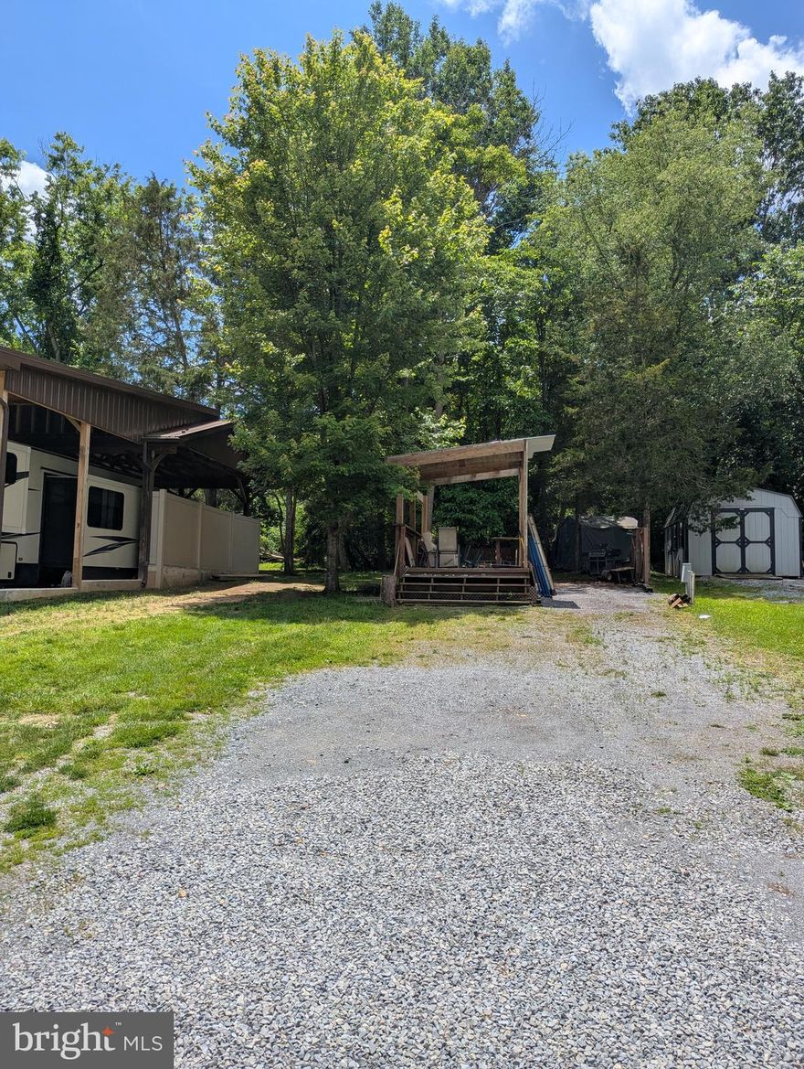 ***Property Details ***   Motivated Seller!!
Get ready to start the river life for 2025,  Lot has river views and backs up to the woods. Lot with deck where you can back your camper right up and start living the river life. **** Lets bring an offer to to table!  *** YOU WON'T WANT TO MISS THIS ONE.*** 
This is a gated community so you need to enter at the guard shack. Entry is not permitted without ID per the office rules. Bring ID's to the office or guard shack for visitor pass. THIS IS A SEASONAL CAMPGROUND! OPEN FROM APRIL 1 TO NOVEMBER 1. ** WELCOME TO RIVER BEND/SEASONAL LOT AVAILABLE TURN KEY** River Bend is a privately owned 400 acre recreational- vehicle camp resort with seasonal activities for members, families and guests. This great RV park is tucked away on the Upper Potomac River of West Virginia, River Bend is one of West Virginia's most popular family seasonal destinations. . Just a short drive from the Washington and Baltimore metro area. Open with utilities from April 1 to November 1. Lot owners have access to their property the entire year. *** Members Enjoy *** * Amazing views and wildlife, Potomac River access, Trails, Swimming pools, Mini-Golf, Youth center, Tennis and basketball courts, laundry facilities, convenience store, deli and lounge. *Bath houses through out the park, boat ramp, bar and grill and even a church located on the grounds. River Bend also hosts numerous activities such as 4th of July fire works, small carnival, bonfires, poker runs, horse shoe tournaments, car show, Halloween Trick or Treat and so much more.