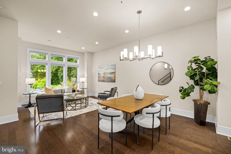 Welcome to your future haven at 142 Winsome Circle in Grosvenor Heights. This modern and inviting home is the perfect blend of comfort and convenience, spanning an impressive 3,100+ square feet, offering three spacious bedrooms, a den-library, and three and a half bathrooms, ensuring plenty of room for relaxation and entertainment. One flight up discover a bright and open main floor with 10' ceilings, a showpiece kitchen, designed to be the heart of the home, perfect for culinary adventures or hosting gatherings with its ample quartz countertop space and sleek, modern Bosch stainless steel appliances and ceiling height cabinetry, all seamlessly flowing into an expansive living area for a connected and inclusive atmosphere. Be it the front living and dining area or the rear family room with a gas fireplace and adjoining deck. 

This home boasts both front and back views that fill each room with natural light, creating a warm and welcoming ambiance, while its thoughtful layout ensures privacy and maximizes space and functionality, further enhanced by a range of thoughtful upgrades designed to elevate your daily life, including Tailored Living Closets & Garage System for organized living, a rooftop Case Designed Outdoor Kitchen perfect for entertaining, a Sonos Ceiling Speaker system in the Family Room for immersive sound, Closet Factory Built-in Library and Family Room Built-ins for elegant storage, Custom Laundry Room Shelving for efficiency, an In-home WiFi Extender for seamless connectivity, and a Leaf Water Solution Filtered Water in the Kitchen Sink for convenience. 

The home is appointed with an elevator with stops on all three finished levels and the fourth floor full length rooftop terrace and steps from Fleming Park. Enjoy the ease of access to downtown Bethesda, Wildwood Shopping Center as well as I-495 and I-270, making commuting or weekend escapes delightfully simple; whether you're hosting a get together on the rooftop or enjoying a quiet evening in the family room, this home is designed to cater to your modern lifestyle, embracing the opportunity to live in a community that combines urban conveniences with suburban tranquility. Discover the endless possibilities that await at 142 Winsome Circle,  a place to call home.