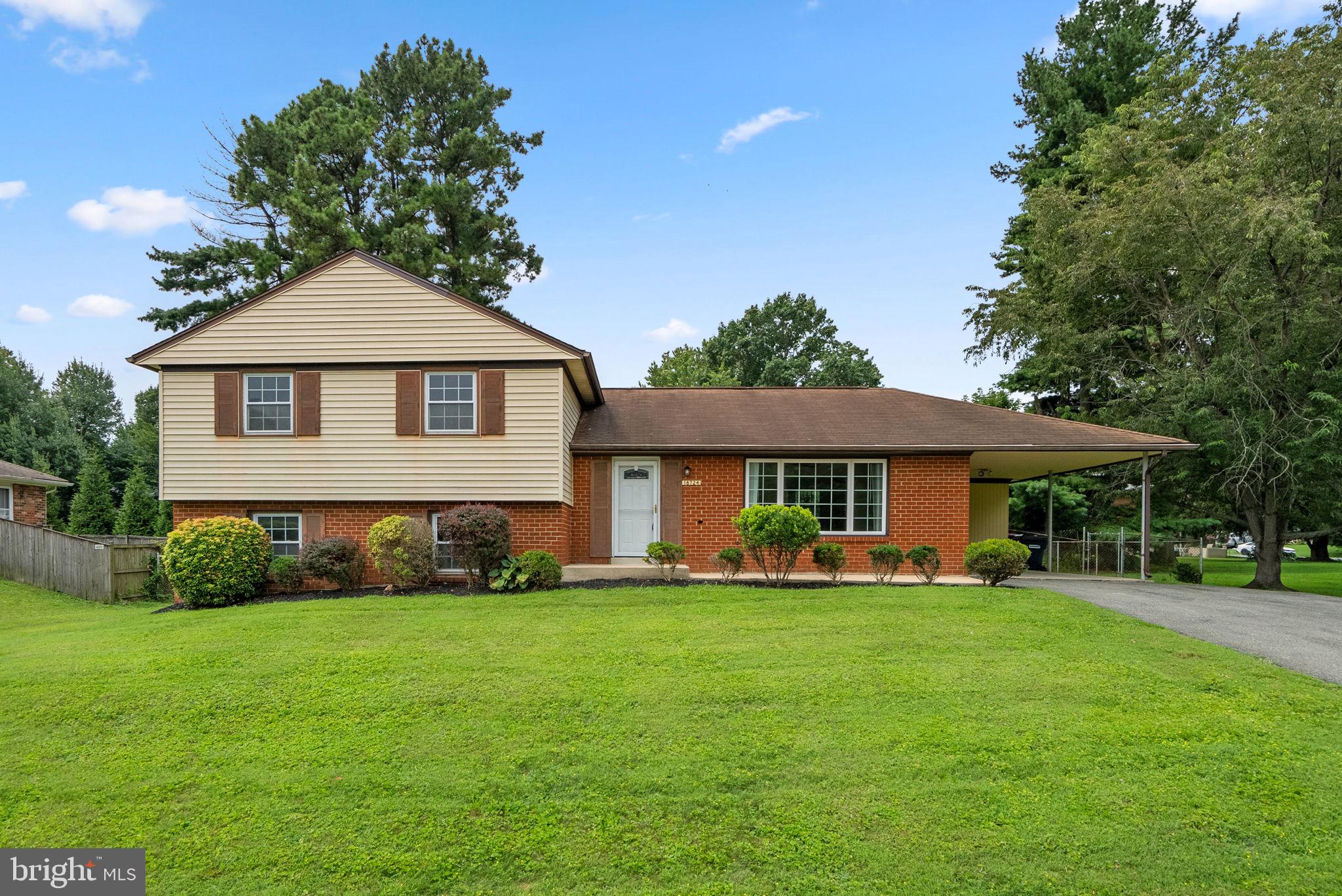 Welcome to this wonderfully cared-for home in the heart of Olney Mill! Featuring 4 bedrooms and 2.5 bathrooms, this home is ready for you to make it your own. Freshly painted and beautifully redone hardwood floors complement natural light shining throughout the home. The kitchen has stainless steel appliances (refrigerator and stove are brand new, along with the washer and dryer!) and plenty of storage space, which makes it an entertainer's dream! The hardwood floors continue upstairs in the 3 generously sized bedrooms, and the 2 full bathrooms are ready for your own personal touch. The first level downstairs features an incredible brick fireplace and an additional bedroom, and also leads to the sunroom that you won't want to miss! Relax in your sunroom and look at the views of your fenced-in backyard. Down one more level, the basement is a blank slate, allowing you to turn it into the basement of your dreams or use it for additional storage space. Don't miss out on this opportunity!