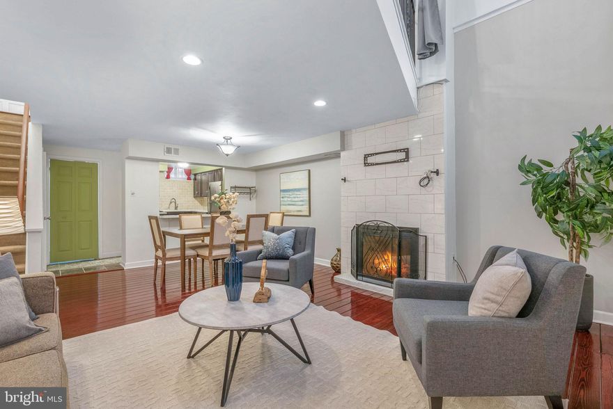 Set in the desirable Washington Square West neighborhood, this move-in ready, freshly painted condo offers a unique layout, abundant natural light, and a great mix of character and modern comfort.

The upper level features two flexible bedrooms and a full bath. The primary bedroom has an open, lofted feel with a large window that brings in excellent light, generous closet space, and a balcony that overlooks the living area below. The second bedroom is thoughtfully designed with a built-in bunk, making it a great option for guests, a home office, or a nursery. A renovated full bathroom and hallway storage complete this floor.

The lower level serves as the main living space, with hardwood floors, a fireplace, and a bright, inviting atmosphere enhanced by overhead lighting and borrowed light from above. The kitchen has been updated with stainless steel appliances, a five-burner range, modern cabinetry, and a clean tile backsplash, along with space for both dining and casual seating. This level also includes a half bath and a separate laundry room.

Residents have access to a secure, gated courtyard with brick walkways and multiple entry points. The location puts you within easy reach of everyday conveniences like Whole Foods Market and ACME Markets, as well as the restaurants, shops, and nightlife along South Street.

With its prime location and versatile layout, this condo is a strong option for both an owner-occupant or an investor.