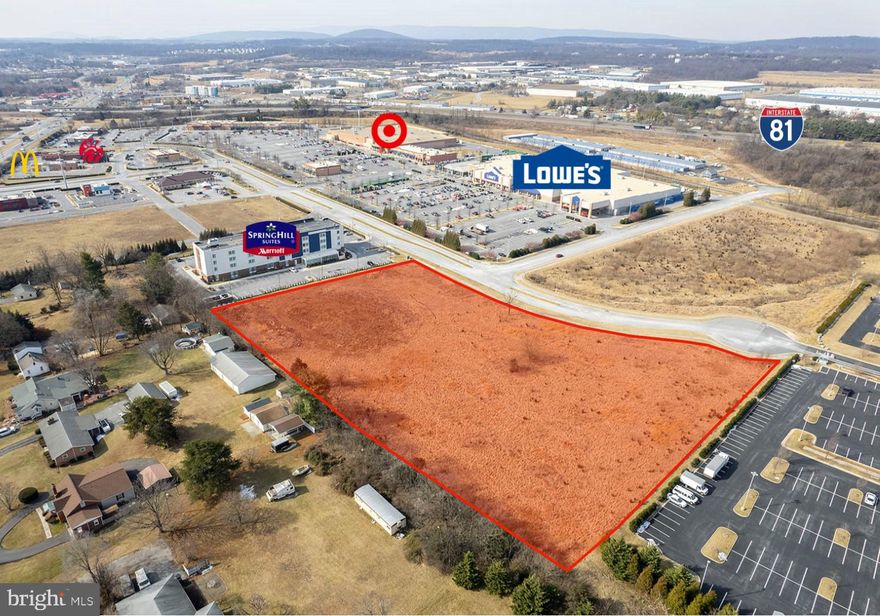 5.08 Acres zoned B-2 in Rutherford Crossing shopping center. Owner will consider subdivision of the property. Directly across from Lowes and Target and next to Spring Hill Marriot Hotel and Suites and FEMA call center. Ideal for hotels, restaurants, office buildings, retail, etc... John Schroth and John Scully, owners are licensed Realtors in the state of Virginia.