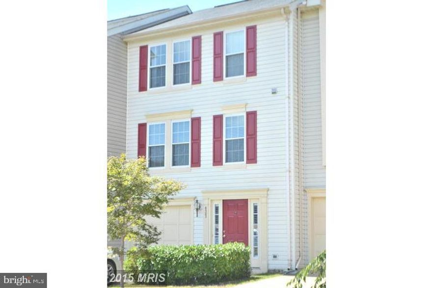 Amazing, upscale townhome in amenity filled Lee's Hill.  Located minutes from community pool.  Gorgeous wood laminate floor on upper level, main living space, trim detail, and white pillars.  Exquisite sitting room with sunlights, marble gas fireplace, and soaring ceilings.  Fully Finished, large basement with ceramic tile foyer and built-in bookshelves.  Wrap around deck backing to woods!