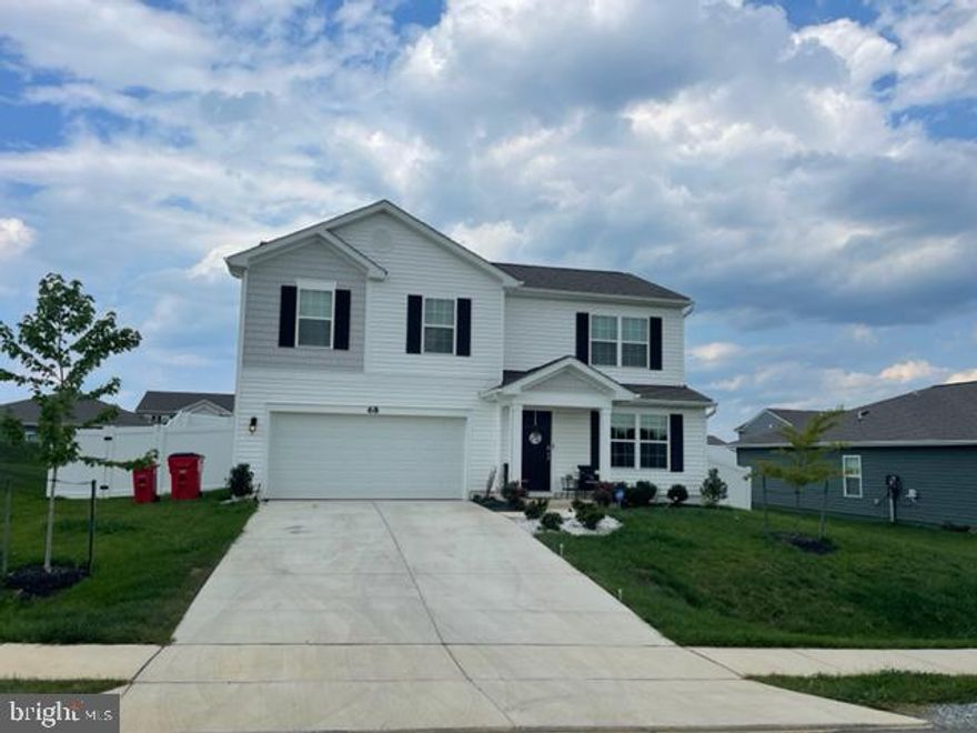 Like new! Shows like a model home! One year old home with beautiful finishes throughout. Luxury vinyl flooring throughout the main level, updated lighting and neutral paint but with a few accent walls. Stunning kitchen with two-tone cabinets, granite countertops, tile backsplash, stainless steel appliances and a pantry. There is a half bath conveniently located near the kitchen, with additional closet space down the hallway. Upstairs are 4 spacious bedrooms, one being the master which has a large walk-in closet and attached bathroom. The 2 car garage has plenty of room for storage and the fully fenced yard with solar powered lights is like your own private oasis.