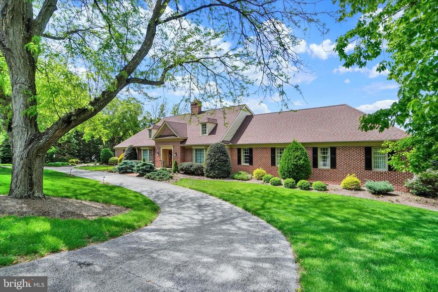 Experience a rare blend of timeless elegance, architectural presence, and exceptional scale in this magnificent all-brick custom estate, perfectly positioned in the prestigious golf course community of Wyndham Hills with sweeping panoramic views of the York City skyline. A grand marble-tiled foyer creates an unforgettable first impression, many custom details  and craftsmanship, from custom accent moldings and four statement fireplaces to an elegant butler’s pantry and an abundance of beautifully appointed gathering spaces designed for both grand entertaining and intimate everyday living.
The first-floor primary suite is a true private sanctuary, offering an extraordinary level of comfort with three full baths, multiple walk-in closets, a dedicated office, and a serene sitting or fitness area. An elevator provides seamless access to all levels of the home.
The second floor features five additional spacious bedrooms, including a remarkable private suite with its own office, balcony, and a dramatic wall of windows that captures breathtaking views and natural light.
Designed for year-round entertaining, the finished lower level offers an additional bedroom and bath, a stylish wet bar, craft room, fitness area, fireplace, and a spectacular four-season room complete with an indoor grill — creating the ultimate space for hosting in every season.
Additional highlights include multi-zone heating and cooling, an updated architectural shingle roof, and an unbeatable location just minutes from the renowned York Country Club for premier golf and social experiences. Enjoy quick access to the York Rail Trail for walking, running, or biking, vibrant downtown York dining and entertainment, WellSpan York Hospital, and I-83 for convenient commuting north or south into Maryland.
This is more than a home — it is a statement of lifestyle. A truly extraordinary property that must be experienced in person to fully appreciate its scale, design, and unmatched entertaining potential.