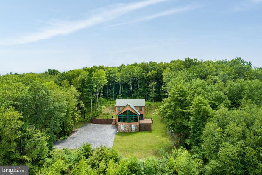 300 acre hunting retreat located close to State College with a 5 year old, 7 bedroom luxury cabin and 1 car garage.  Property is being offered with cabin fully furnished and food plot equipment.  Property has lots to offer, 16 acres of food plot/fields, excellent deer & turkey hunting, creek and camping site, 24' x 32' equipment building, tennis court, floor heat in cabin, water purifying system, laundry area, 1000 gal. propane tank, lots of other items not listed.  Items included in the sale of property are cabin furniture, 55 horsepower tractor, disc, bushog mower, lime spreader, crop sprayer, 2-redneck hunting blinds & 9 tree stands.  Property is being sold ready to move in and hunt.  Property consists of a total of 4 parcels sold as one and is conveniently located and easy to access.  Great hunting property and Air B&B.  Reason for selling, is owners have outgrown this property and moving to a larger one.  OGM's are available to purchase but do not convey.  Don't miss out of this opportunity!