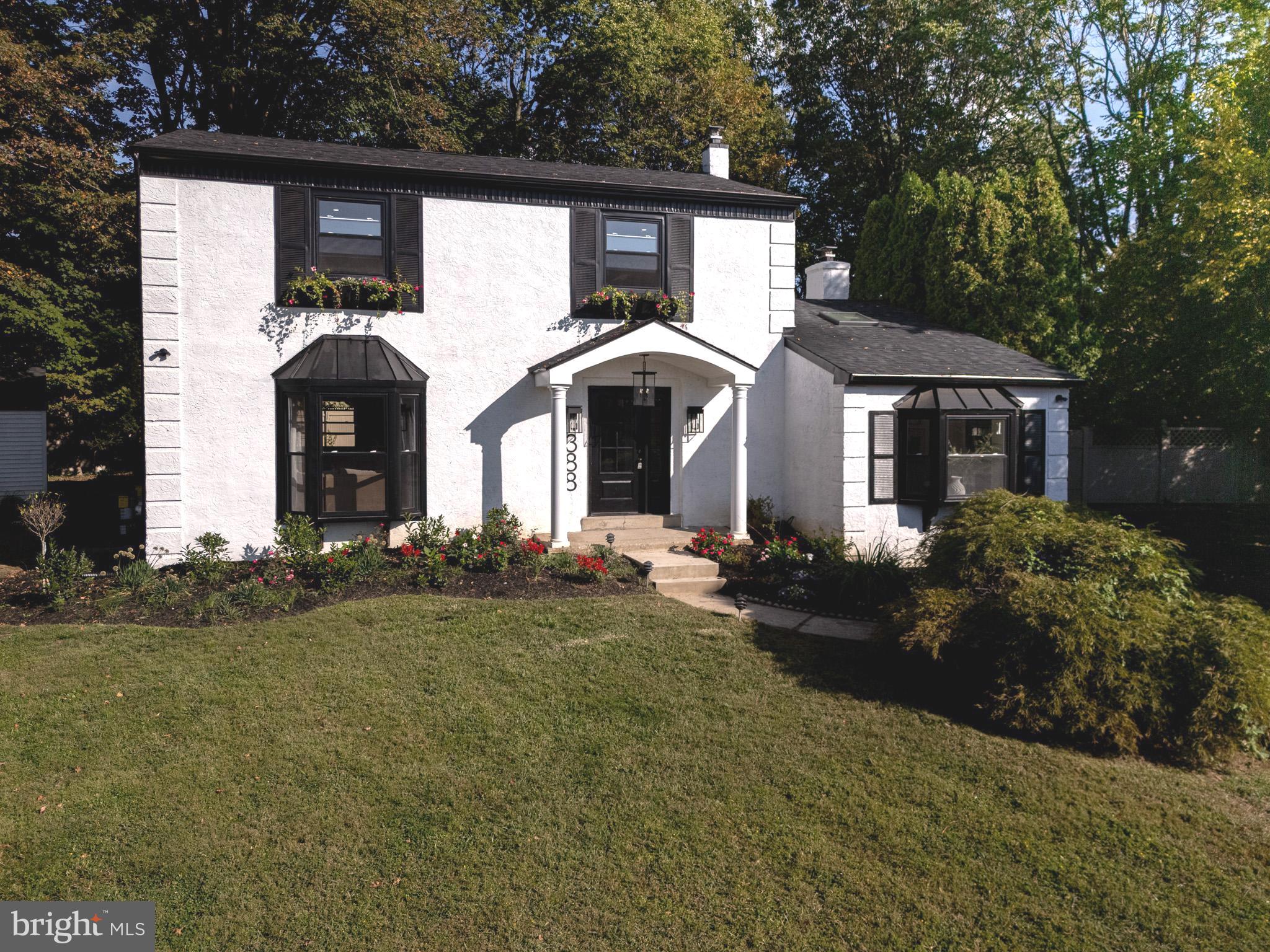 Welcome home... this thoughtfully designed Transitional home in Wynnewood is situated at the top of the cul-de-sac which offers great views from this vantage point. The property has been completely renovated with 4 nicely sized bedrooms, 3 full baths and a half bath on the first floor. The open floor plan is fabulous and is full of natural light and pleasantries with a large living room and dining room combo and open kitchen concept with a 9' foot island that seats 4 comfortably. The kitchen flows nicely and gives you plenty of space to prep, cook and gather. For added space, a banquette seating area has been added to give you the additional seats for more informal eating. And for entertaining, an amazing den/study/family room was designed specifically for you to relax, read and entertain guests. The ceilings have been raised and 2 skylights installed to give you that bright and airy feel. Also, there is a charming brick wood burning fireplace and a kitchenette area with a wet bar and wine cooler. The second floor is spacious and flows nicely with the primary bedroom in the rear overlooking the patio and garden. The hall bath has been remodeled offering a tub/shower combo and a 42" vanity. The primary bedroom and bath have high ceilings with the tile extending upwards to the ceiling, and a 48" vanity. Each bedroom offers plenty of closet space and natural light. The lower level features another family room with a full bath (tub/shower combo), storage and a laundry area. Other amazing features of the home include white oak floors throughout, modern lighting, a tankless hot water heater, a new roof, an inground pool and an EV Charger for added convenience. Located in an Award-Winning School District and being just minutes away from Whole Foods, Giant, a shopping center, etc., this home is bound to meet all of your modern day needs and more! Come and make this remarkable home - YOURS!