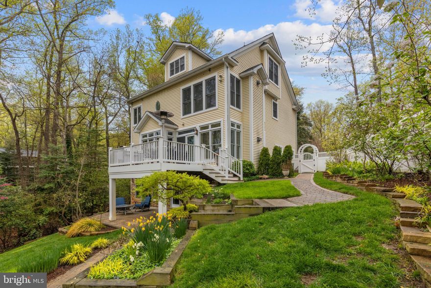 GET READY FOR YOUR BEST SUMMER EVER! This waterfront home is nestled in one of Annapolis’ sought-after neighborhoods. Inviting and beautiful décor punctuates views of water and private setting. Tons of windows and flooded with light! Conversational style living room opens to formal dining in a comfortable traditional layout. Stunning kitchen is surrounded by windows and features a large island, gas range, and plentiful cabinets. Kitchen dining area overlooks natural wooded vista. Stone-faced fireplace is the focal point in the bright family room that leads to a large deck and  features waterviews. Rich warm wood floors flow from room-to-room throughout! Primary suite features water views, gas fireplace, plantation shutters, and a stunning bath with soaking tub, glass shower & separate sinks. Large walk-in closet has custom shelving. Full laundry on second-level. Two additional bedrooms and baths have been beautifully updated with designer touches. Lower level features a third fireplace, wet bar, and glass sliders to the back yard. Great for a fifth bedroom or an office! New custom steps and walkway lead down a gentle slope to the private dock (4 feet MLW). Your neighbors will include herons and turtles as the headwaters of Lake Ogleton offer a quiet respite for all! Whether you like to kayak or want to power or sail out to the Chesapeake Bay, you will have quick access to all the water activities Annapolis has to offer.  Lake Ogleton is a water skier's heaven and the open waters of the Chesapeake are a sailor's paradise. Annapolis Roads has a private community beach and picnic area on a bluff with stunning views of the Severn River and the Chesapeake Bay. This established community is convenient to the restaurants and marinas in Eastport or to major commuter routes. New HVAC 2019, New Hot Water Heater 2020, New HVAC 2022.  Annapolis Roads is a Special Tax District, and the HOA is included in the annual property owners tax.