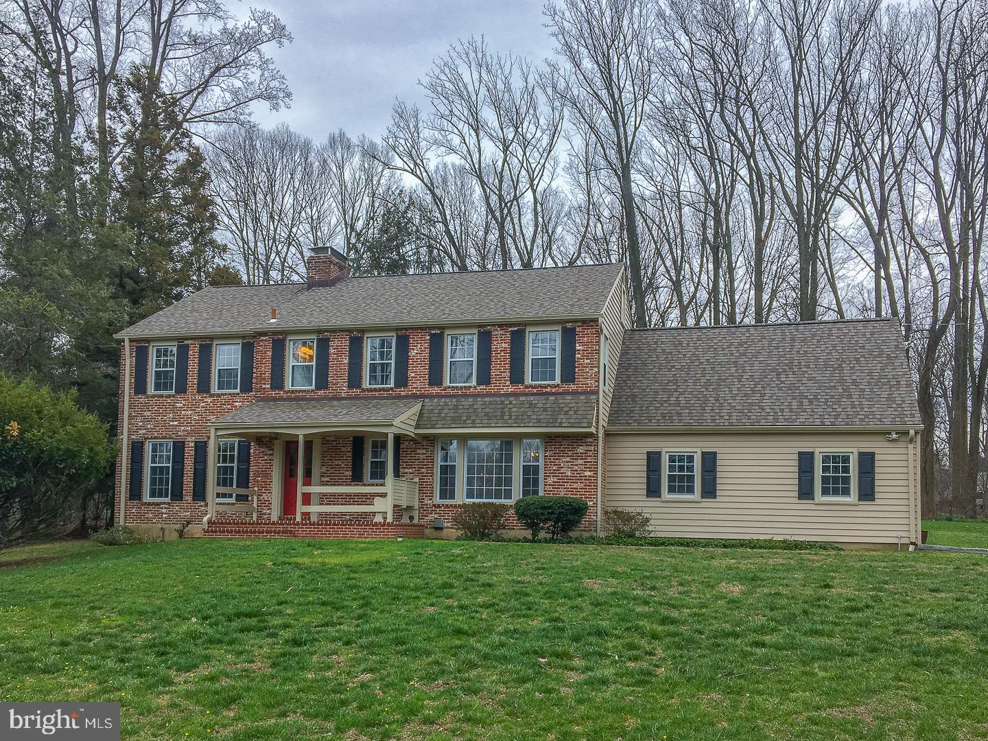 Positioned on a beautiful flat lot which adjoins the walking trails and preserve grounds of Saunders woods , find this classic 5 bedroom, 3 full and 1 half bath handsome brick colonial home with welcoming front porch and exciting, expanded interior floor plan . A blend of brick and richly stained hardwood flooring sets the stage for the craftsmanship found throughout the home. A formal living room with three exposures of light and wood burning fireplace sits to the left side of Foyer while, to the right, the formal dining room enjoys a walk-in china room and full wall of windows overlooking the front yard and brick walkway. An open concept kitchen with Thermador gas cook top, granite counters and seated island flows into the breakfast room highlighted with raised wood burning fireplace. A large family room spans the full kitchen and breakfast area and overlooks the rear yard , terrace and deep wooded perimeter. Steps away from the family space is a private study, complete with custom shelving, an ideal location for work or a quiet conversation. Once purposed as a first level in-law suite, now a gym/fitness room this beautiful bright space opens to a screened porch for maximum year round enjoyment. A full laundry, formerly a bath for the in-law area, walk-in shelved storage and family entrance from the 2 car garage complete this level. . Ascend the Foyer stair to a center hall that leads to 3 Bedrooms, each with generous closet space, a beautifully refinished hall Bath, 2 linen closets and the Master Suite. The Master Suite offers wall to wall carpeting, 2 large closets, one walk-in, and a Master Bath. The fifth bedroom is accessed from the rear stairs providing a private bath with shower. Lower level offers unlimited possibility with large unfinished recreation space , mechanicals and primary storage. Ideally located on a mature Gladwyne cul de sac, this home provides all the comforts and amenities one needs in a home.