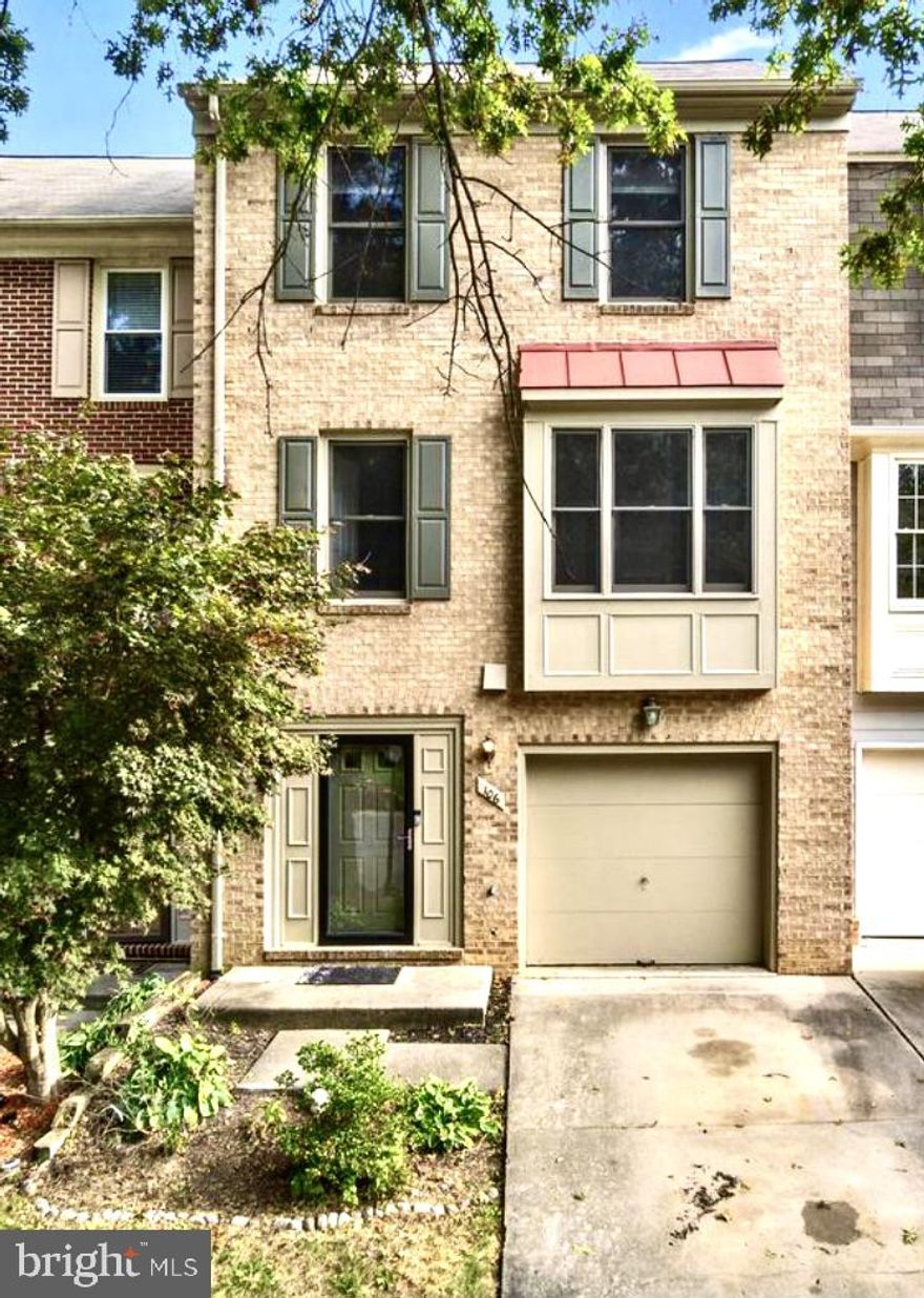 Immaculate with fresh paint throughout and all new flooring.   The foyer is a low-maintenance tile. -. The kitchen has space for a table, plus plenty of cabinets, and brand-new granite.  The rec room is fully above ground, a true walkout, with a bar with a sink and a fireplace. The upper level has 3 spacious bedrooms and 2 full baths. The primary suite has 2 skylights, an attached bathroom with a double vanity, and a walk-in closet. All new carpet throughout the upper level and rec room, plus new LVT flooring in the bathrooms. A large deck with stairs down to the fenced backyard.     LESS than 0.15 miles to the HISTORIC beautiful Occoquan and the Occoquan Riverfront. Enjoy all that area has to offer with restaurants, shops, stores, coffee bars, drinks, and even Mom's Apple Pie!