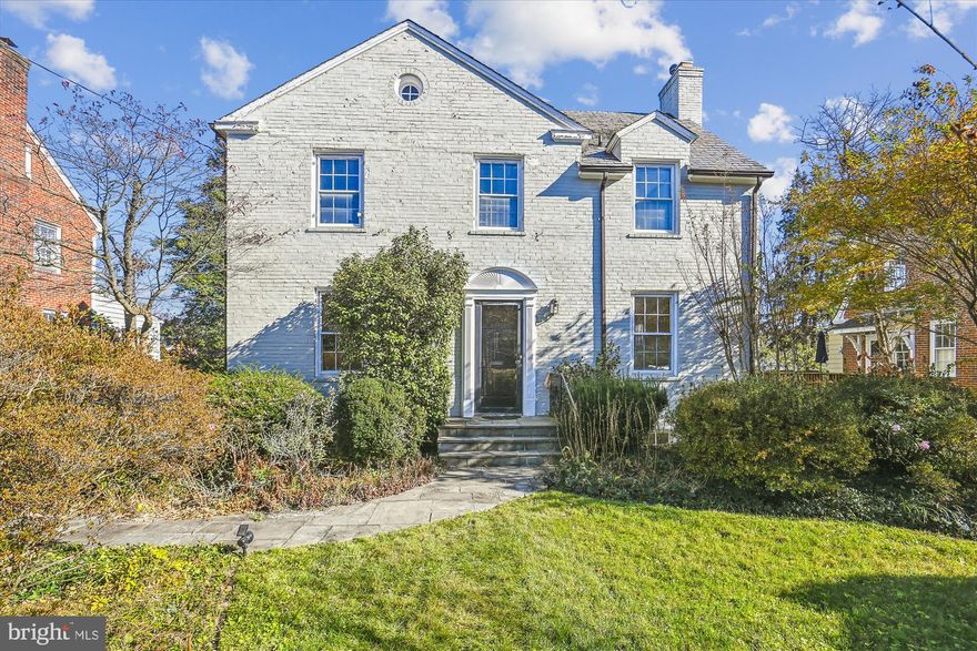 Center hall colonial 3 bedrooms up with two full baths light and bright rear sunroom with deck overlooking rear garden.  Formal living and dining room, rear study / sunroom , full lower level with full bath, garage and walk out.