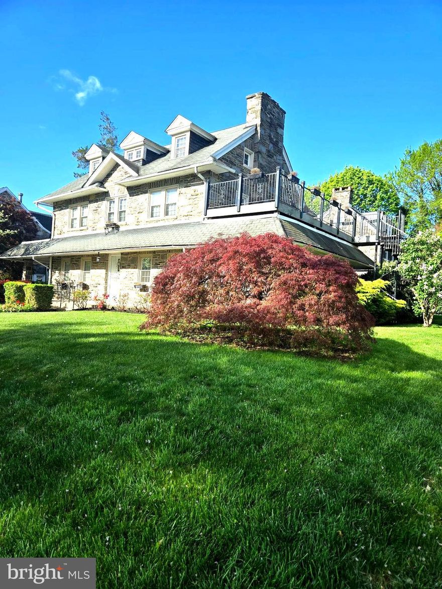 Beautiful 6 bedroom home in Historic Wynnfield.  This large 6 bedroom home now has 4 bedrooms, with walk in closet and office.  Those rooms can be converted back to bedrooms.  The first floor has a large living room  with wood burning fireplace,  sun room with wood burning fireplace, dining room, breakfast room, kitchen and powder room.  Second floor has a primary suite with bath, walk in closet, family room and office.  Third floor has 2 large bedrooms and 2 full baths.
The finished basement consists of a Home Theater with Surround Sound and Heated Tile floors, Wet Bar and Full Bath.  
There's a rooftop deck for entertaining, outdoor Living Room, Dining Room, Kitchen and Jacuzzi for 6.
This Beautiful Home is close to the Main Line, City Ave. Shopping and St. Joe's University. Minutes to Center City.
Over 7500 Square Feet of Indoor & Outdoor Living Space.
Detached 2 Car Garage with 2nd Floor Card/Cigar room with TV and it's heated!