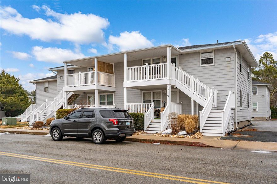 Best-priced 2-bedroom condo in all of Ocean City! This top-floor, corner end unit in North Ocean City offers a cozy coastal retreat with a classic beach-cottage feel, featuring warm knotty pine walls throughout. The 2-bedroom, 1-bath layout is ready for a new owner to make it their own. The living room includes a wall-unit system providing both heat and air conditioning. Enjoy a south-facing balcony with a peek of the canal, perfect for relaxing after a day at the beach. Community amenities include plenty of parking and an on-site area with washer and dryer. What an excellent opportunity for an affordable beach getaway!  Wedgewood is located in the desirable Caine Woods community just off 142nd Street, offering a convenient location near Harpoon Hanna’s and other popular dining options. Just a few blocks from Fenwick Island, the beach, water park, miniature golf, 2 marinas that rent boats & jet skis, and a playground—this location puts all the best of coastal living right at your fingertips!