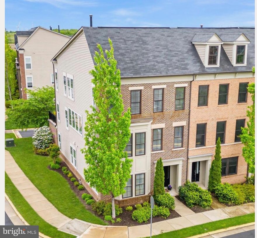 Discover this stunning 4-bedroom, 3.5-bath end-unit townhome in the highly sought-after Brambleton community, offering over 3,000 sq. ft. of beautifully upgraded living space. Beautifully renovated in late 2023, this home features new quartz kitchen countertops, a high-end Jennair cooktop, a new dishwasher, disposal, and cabinet sink hardware, ensuring a modern and functional cooking space. The main living area boasts two custom built-ins, a new ceiling fan, and a stylish custom kitchen light fixture, adding both elegance and convenience. The basement has been thoughtfully enhanced with new custom built-ins, under-stair storage, a custom closet, bathroom storage, and fresh tile in the basement bathroom. New engineered hardwood flooring spans 2.5 levels, complementing the home’s sleek, contemporary design. Additional upgrades include a new washer and dryer, new smoke detectors, and an electric car charger for ultimate efficiency and peace of mind. Designed for comfort and style, this home offers an open floorplan, stainless steel appliances, a dual-fronted fireplace, and a spacious deck perfect for entertaining. The end-unit location allows for extra privacy and an abundance of natural light throughout. Nestled in the heart of Brambleton, this move-in-ready home provides easy access to shopping, dining, and community amenities. Don't miss this incredible opportunity—schedule your showing today!