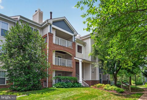 Photo of 21029 Timber Ridge Terrace #302, ASHBURN, VA 20147 (MLS # VALO2130126)