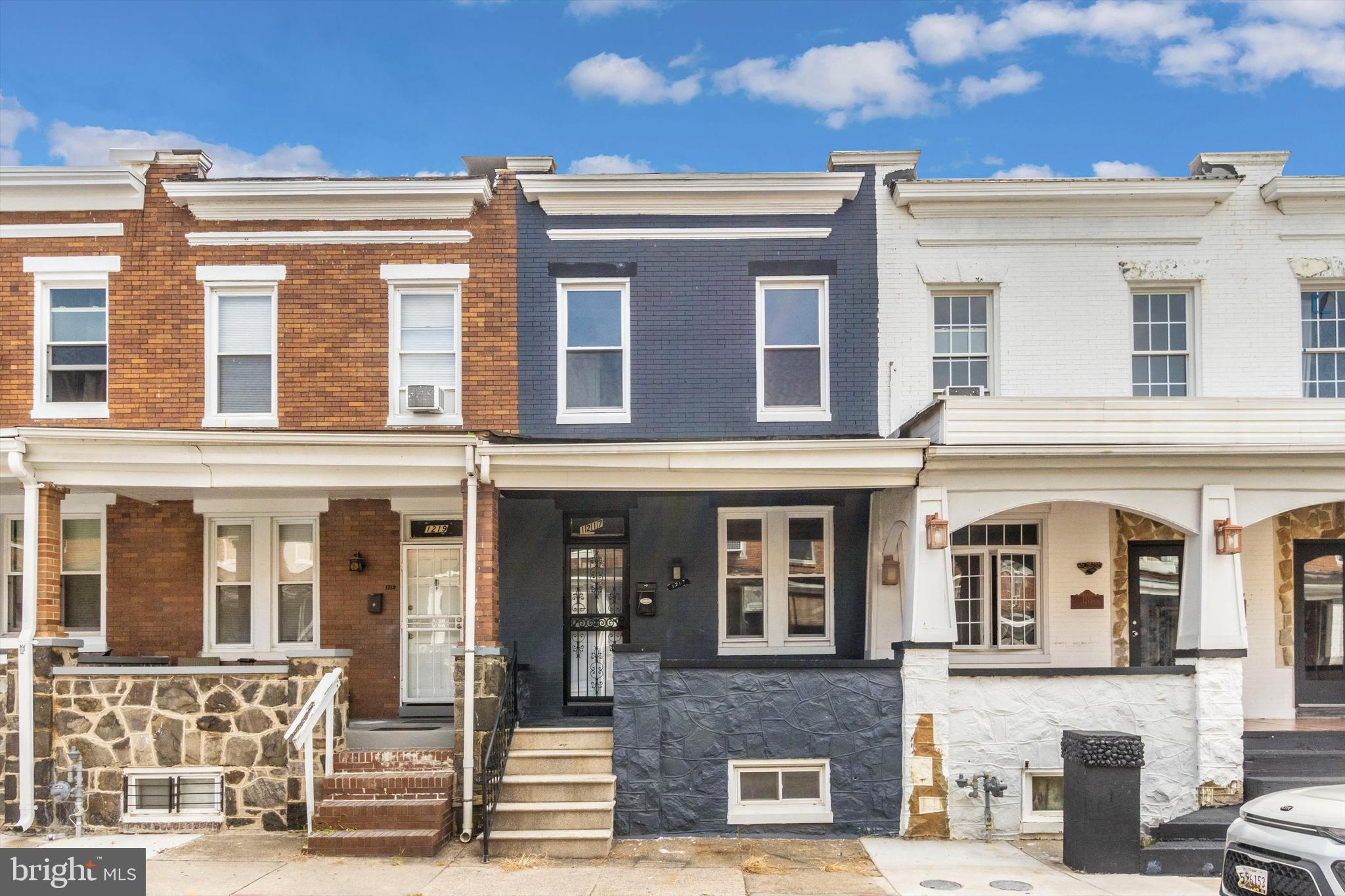 Call to ask about the new rent to own program. Welcome to this newly custom-renovated, three-bedroom, three full bath home in Baltimore! This property is move-in ready, with all the work already completed. The main level boasts an open concept design, making it perfect for hosting holiday gatherings. Some of the notable features on the main level include gleaming hardwood floors, a tray ceiling, upgraded and recessed lighting, and exposed brick, giving the space a warm and inviting atmosphere. The oversized kitchen is a dream for any home chef, featuring stainless steel appliances, ample cabinet and counter space, and a beautifully tiled backsplash. The upper level of the home offers two generously sized bedrooms and two full designer bathrooms, ensuring comfort and privacy for the residents. Meanwhile, the lower level includes the third bedroom and a third full bathroom, as well as a family room, a laundry closet, and space for a home office, providing versatility for various living arrangements. Enjoy relaxing evenings on the covered front porch, or host gatherings on the rear patio, which offers ample space for outdoor entertainment. The property's location is convenient, with close proximity to Johns Hopkins, the University of Maryland, Downtown Baltimore, shopping, and major commuter routes such as 95, 895, and 695. Additionally, be sure to check with your agent or lender to see if you qualify for any grant programs that Baltimore City offers, such as the Maryland Mortgage Program, Live Near Your Work, City Block, FHLB, or Project Reinvest, which can provide valuable financial incentives for homeowners. Appliances will be installed before closing, making this property truly move-in ready. Welcome to your new home at 1217 N Curley St in Baltimore, where modern amenities and a great location come together to offer a comfortable and convenient lifestyle. Don't miss the opportunity to make this your home!