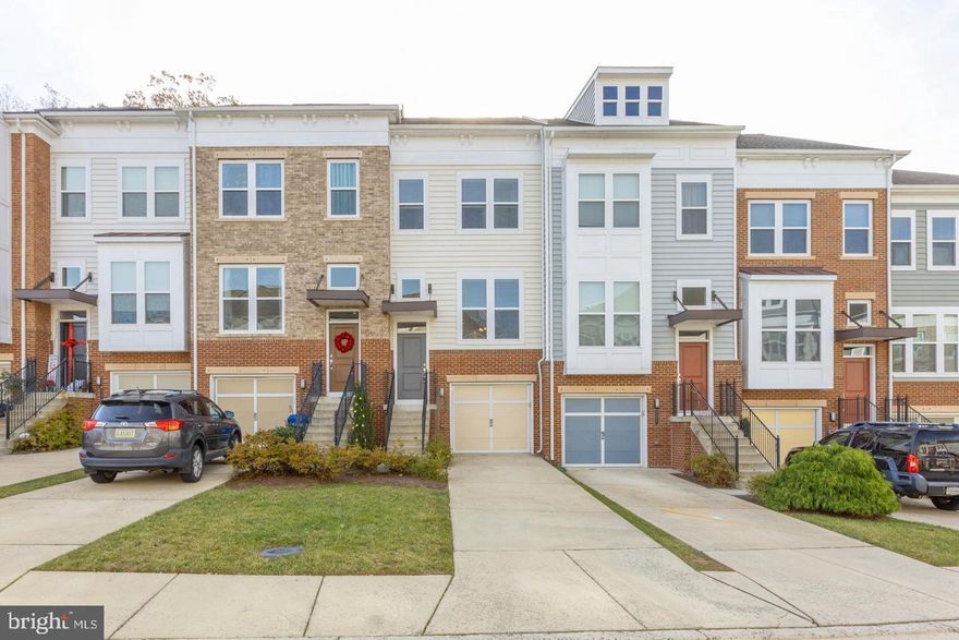 WELCOME TO THIS BEAUTIFUL THREE LEVEL TOWNHOME IN BRAMBLETON * Freshly painted top to bottom * One-Car Garage with Opener and Covered Entry with Recessed Porch Light * Fully Fenced Backyard with Gate * TWO-STORY FOYER with Hardwood Floors, and Wainscoting * LIVING ROOM with Hardwood Floors and Coat Closet * DINING ROOM with Hardwood Floors * POWDER ROOM with Pedestal Sink * GOURMET KITCHEN with Breakfast Bar, Pantry, Recessed Lights, Granite Counters, SS appliances and Hardwood Floors * Breakfast Area with Sliding Glass Door leading to Trex Deck * OWNERS SUITE with Walk-In Closet, Carpet and En-Suite Luxury Owners Bath with Soaking Tub, Double Sink Vanity and Tiled Walk-In Shower with Sliding Glass Doors * 2nd BEDROOM on Upper Level with carpet and En-Suite bath * LOWER LEVEL with 3rd Bedroom with Sliding Glass Door Access to Fenced Backyard * 3rd Full Bath with Tub/Shower Combination and Sink Vanity * Garage Access to One-Car Garage with Opener * LOCATED in the Briar Woods school pyramid * ENJOY BRAMBLETON AMENITIES with Brambleton Town Center, Brambleton Golf-Course (Membership Available), Restaurants, Shops, OneLife Fitness, Movie Theater, State-Of-The-Art Library, Farmers Markets, 18 Miles of Walking/Bike Trails, Tennis Courts, Parks, Dog Park, Pools and Clubhouse * Easy Access to Dulles International Airport and Future Ashburn Metro Station* HOA INCLUDES: Highspeed Internet, Cable TV, Lawn Service, Seasonal Mulching, Trash and Snow Removal *