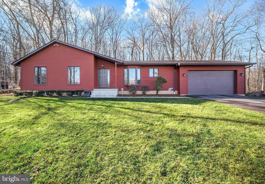 Welcome to 2028 N Rockhill Road, a beautifully maintained 3-bedroom, 2-bath rancher set on a private 1.5-acre lot with serene woods behind the home and breathtaking mountain views from the dining room window. This light-filled home features abundant windows throughout and a beautifully updated, extended kitchen with a high-end cooktop, double wall oven, and countertops that flow seamlessly into the family room. Luxury vinyl flooring enhances the main living areas, while the primary suite offers a private entrance to the back deck. Step outside to the rear deck with a charming gazebo, ideal for relaxing in a peaceful natural setting. Additional highlights include a partially finished basement, spacious attic storage, a large extended driveway accommodating multiple vehicles, a home generator, and a whole-house UV water filtration system. All major mechanical systems have been updated in recent years, delivering efficiency, reliability, and confidence in your day-to-day living. Make your appointment today!