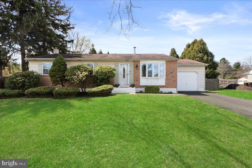 Welcome home to this charming rancher in Doylestown! This lovely, well maintained 3 bedroom, 2 full bathroom property offers the ease of one level living in a convenient and desirable Doylestown location. As you walk in the front door, you are greeted by the open, freshly painted neutral living room with wood floors and a wood burning stove. Down the hall you’ll find the spacious primary bedroom with an attached full bathroom. Adjacent to the primary bedroom are 2 additional bedrooms and a full hall bathroom. Rounding off the main floor is the kitchen, that offers wood cabinets, Corian countertops, tiled backsplash and a built-in island. Off the eat-in kitchen are sliding doors that provide access to the outdoor patio and the private, fenced in back yard perfect for children and/or pets. We can’t forget to mention the full, finished basement because it is HUGE! It includes an entertainment area, additional open play or workout space, sizable bonus storage closet, and a large laundry room. The one car garage offers ample storage space and a convenient back door for direct access to the back yard. The oversized driveway makes parking and entertaining friends and family easy! This move-in ready home is conveniently located close to downtown Doylestown, shopping and restaurants, major roadways and more!