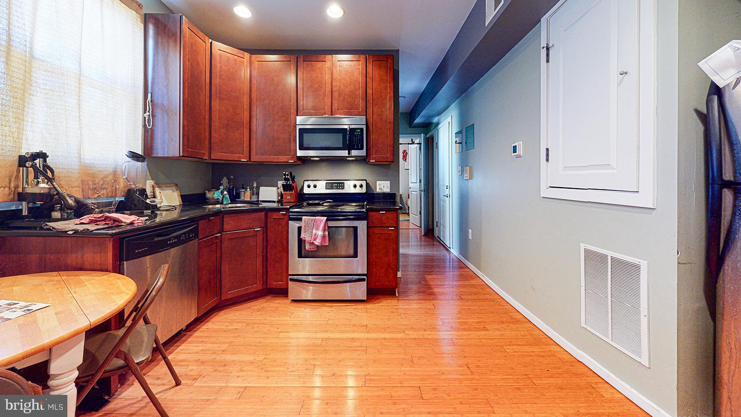 *NOW CONDUCTING VIRTUAL TOURS!!* Enjoy this beautifully renovated 2 bedroom, 1 bathroom apartment with hardwood floors throughout, washer/dryer in unit, recessed lighting, central air and kitchen with granite counter tops and stainless steel microwave, dishwasher, and electric range. You'll be steps from Cedar Park and everything that Baltimore Avenue has to offer! With windows on 3 sides, this unit receives a tremendous amount of light, and tenants have access to a shared rear yard and large front porch.*Sorry, no pets