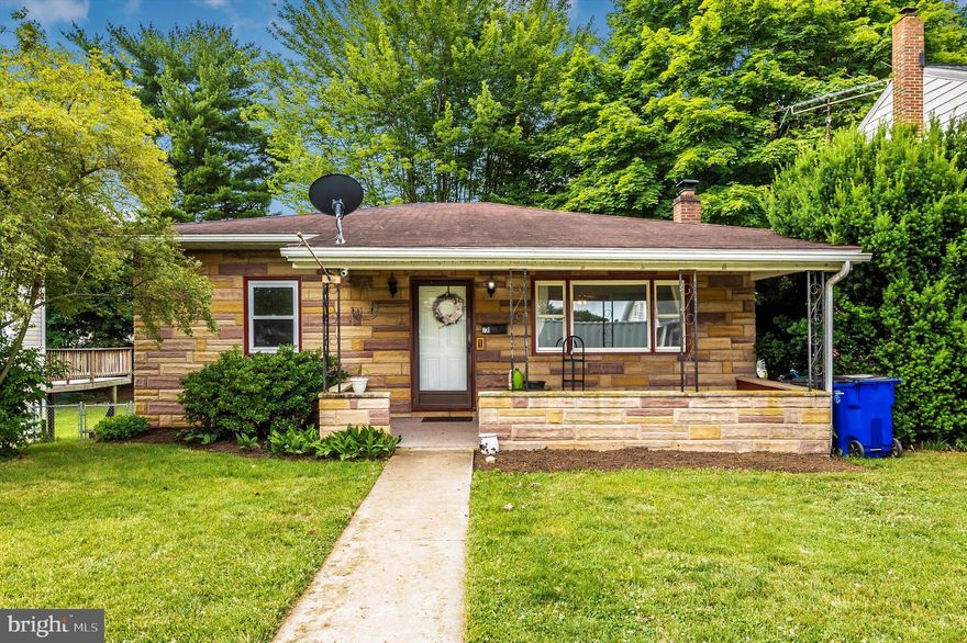 Back on the market! Their loss your gain! Move in ready!  This adorable 3 bedroom, 2 bath home features: new flooring throughout,  large updated kitchen with newer appliances, custom wood side counter (not included, but negotiable)  in kitchen and built-in custom shelves, large separate dining room, covered front porch, lower level family room with new wood bar and rec room area leading to rear patio, unfinished area in basement for storage and separate woodworking shop.  Additional bathroom in basement.  Separate laundry area.  Hardwood floors throughout the main level bedrooms.  Super cute backyard with ample space for entertaining!  City park is within walking distance.  (Playset is negotiable)
This is the perfect starter home!