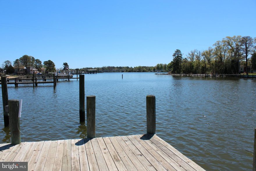 Price Reduced! Large Waterfront Building Lot on Protected Neale Sound (Boaters Dream) & close to Potomac.  Has 3 Lots Existing Older Home Needs to be Removed. Lots already have newer Seawall, Pier w/ additional finger Pier for Boats. Detached Garage, Newer Deep Well & is connected to Public Sewer. Just pick new House Plans! NO HOA Buy Now Build Later!