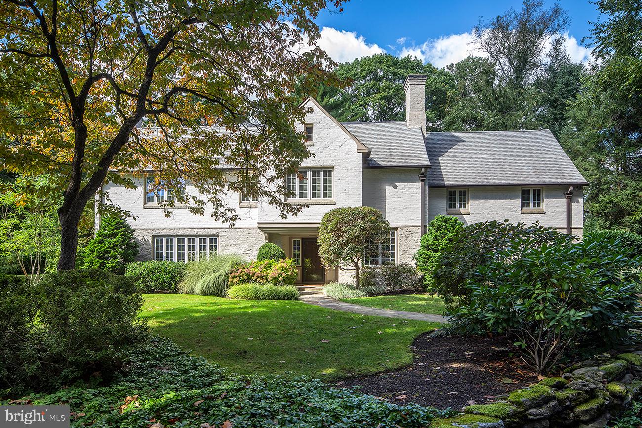 ****10/3/21 OPEN HOUSE CANCELED****
Beautiful 5 bedroom 4.5 bath residence on a tree-lined private road, walkable to the town of Haverford. Nestled amidst grand Main Line estates, this hidden gem sits on more than half an acre of manicured grounds, offering abundant outdoor entertaining areas surrounded by mature trees, and a picturesque flat lawn. Charming elements of the original house designed by famed architect Walter Durham have been retained throughout including deep window sills, elegant moldings, and built-in shelving; while the design team Widell & Boschetti have infused the spaces with modern style using neutral tones and refined finishes.
In turnkey condition and perfect for your family, 35 Evans Lane has been recently repainted and finely refurbished. New rear Anderson windows, new AC and forced hot air, refinished hardwoods throughout, new lighting, a tank-less water heater, full house generator, and finished 3rd-floor with a full bath & storage are among the thoughtful upgrades.
The open flow between the sun-bathed living room, family room and gracious formal dining room creates an inviting atmosphere whether you are enjoying it with family or entertaining friends. The expansive chef’s kitchen features a spacious center island, soapstone counters, top-of-the-line appliances, new custom tiled backsplash and a built-in workstation. Sliding doors lead from the sunlit breakfast area to a beautiful patio perfect for indoor / outdoor entertaining.
The comforts continue with a painted wood paneled den/office, upstairs laundry and generous bedrooms. Unwind in your spacious primary suite with a gas fireplace, fitted walk-in closet, and phenomenal Waterworks spa bath. A bamboo vanity & floor, sleek dual sinks, oval soaking tub, and oversized glass shower with soothing river rock & pebble flooring creates a pampered experience. Completing this enchanting home is a finished lower featuring a climate controlled, glass enclosed 700-bottle wine room. You’ll love the serenity of the quiet location along with the convenience to town, the Merion Cricket Club, nature trails and other amenities.