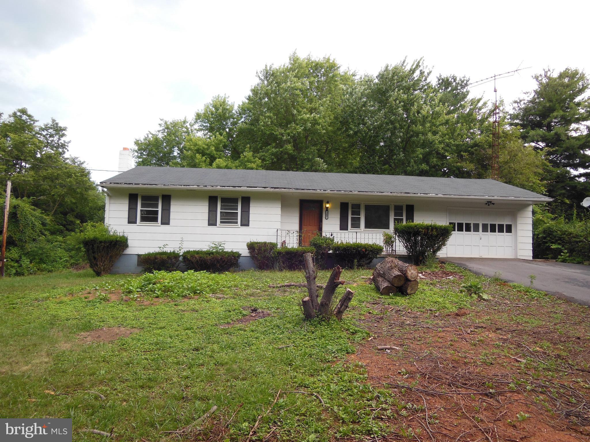 Ranch style home, 3 bedrooms, 1.5 baths, HWF, Stove, Ref, W/D. Wood stove in basement, new bath fixtures, fresh paint inside, basement is partially finished for additional living space. 26x12 screened porch.
