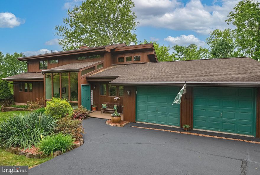 This is a remarkably clean 3/4 Bedroom Contemporary home in the heart of Exeter Township.  The primary bedroom suite with its beautiful wooden ceiling area is on the upper level and has its own loft sitting area and a renovated primary bath.  On the main level are two bedrooms and a full bath along with a spacious kitchen area with newer stainless steel appliances and a huge great room area with stone fireplace which will heat the area quickly if so desired.  The vaulted ceilings really provide that wide open spacious feeling not seen in most homes of today.  Its hardwood flooring and light colored wooden accents are warm and inviting.  The great room pretty much has a wall of windows each with blinds to set the amount of light you'd like.  If you like natural light this is absolutely the home for you as everywhere you turn your graced with natures light. You also have the ease of a main floor laundry...On the lower level you basically have a whole new living area for other family members if you'd like or use it the way it's set up presently.  There is a large office area and a sitting/living room area again with widow space and there is another possible 4th bedroom and a half bath which could conceivably be converted to a full bath making this an even more comfortable space.  This home has it all..Photos are great, but a personal visit is what you need!