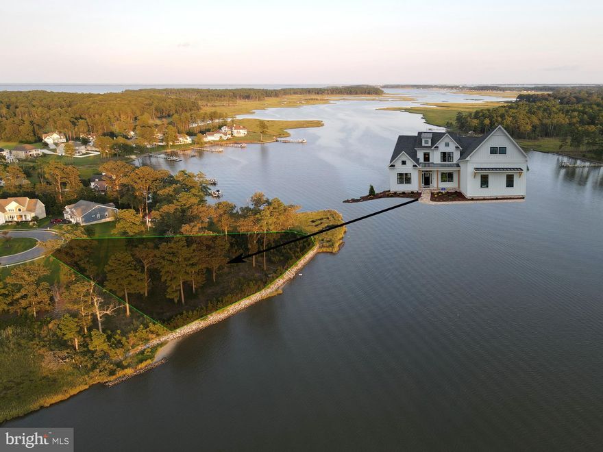 Premier waterfront 1.15 acre lot-home package with panoramic views of beautiful Herring Creek. This is a rare opportunity to build a beautiful new home by the 2023 Delaware Home Builder of the Year, Capstone Homes! The award winning Hannah model by Capstone Homes boasts 5 bedrooms and 3.5 bathrooms. Located on a private cul-de-sac, this point lot has more than 200 feet of rip-rapped shoreline and offers many unique possibilities.  Ability to install a boat dock/lift and a private pool if desired. Direct boat access to Rehoboth Bay and Atlantic Ocean.  High elevation lot. Enjoy spectacular sunsets over the water from the back of the house.  This lot is located in the community of Bay Pointe, which has a variety of amenities including a community pool, clubhouse, fitness center,  large waterfront gazebo, kayak racks and pier. Close to tax-free shopping, golf, restuarants and the beach.