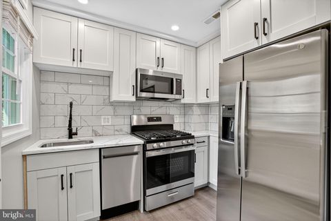 Photo of 1704 E West Highway #1704, SILVER SPRING, MD 20910 (MLS # MDMC2204276)