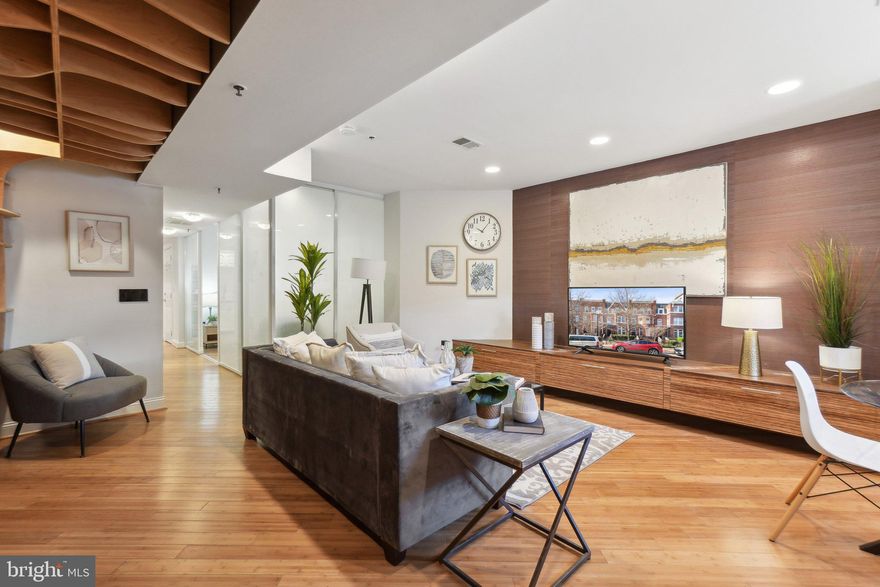 Located in the heart of Dupont Circle this 755 sqft condo has 9ft ceilings, open floor plan, cozy patio, and a private entrance. Walk-in to your living and dining space with a wall of custom built-ins for books, art, or home office storage. The floating entertainment center balances the space with room for your favorite full sized deep couch. The ELFA custom walk-in closet houses your stacked laundry. The flexible bedroom space has movable walls to control privacy or open the space for a more contemporary feel. Continue back to your updated(2022) full bath with custom tile, vanity, tub and lighting. The corner kitchen has ample storage, updated(2022) quartz counters, backsplash and deep rectangle sink. Rounded out with a suite of stainless appliances. Out the back door to your private patio leading to a lightly used shared yard space. The low fees are due in fact to the self managed association with 12 members through three row homes. Rated with a Walk Score of 99 this location cannot be beat. Just two blocks to Safeway, 2.5 blocks to Whole Foods as well as a mix of retail and restaurants on 17th ST NW including local favorites like Annie's, Astoria, and the old school and always pleasant True Value Hardware and Garden Center. Just two blocks to Dupont Circle and the Red Line metro, 3 blocks to the Logan Circle retail strip, and 7 blocks to the always popular Meridian Hill Park.