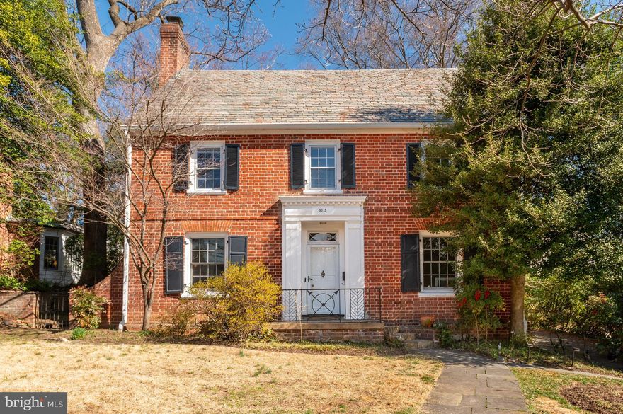 Located in the highly sought after Westmoreland Hill neighborhood, this Center Hall Colonial perfectly blends classic charm with modern updates. The traditional floor plan highlights hardwood floors throughout the first and second floors, oversized windows, and detailed crown moldings. As you enter, you're greeted by a welcoming foyer that offers a formal dining room with beautiful chair rail moldings on one side and an expansive formal living room featuring a cozy wood-burning fireplace. This entire space radiates warmth and character, perfect for hosting guests.The adjacent sunroom is bathed in natural light with sliding glass doors that open to the expansive back patio, ideal for outdoor relaxation and entertaining.The updated kitchen is a chef’s dream, featuring stunning Calcutta Valentin quartz countertops, sleek stainless steel appliances, a subway tile backsplash, and a pantry for all your storage needs. Completing the main level is the den with built-ins and direct access to the driveway, making it a great space for casual gatherings or watching your favorite shows.
Upstairs, the second floor offers a private home office with a fireplace and built-ins, three generously sized bedrooms,and  two bathrooms, including a spacious primary suite with a walk-in closet and an en-suite bath. The third level boasts a fifth bedroom and an expansive attic space with the potential to be finished, offering endless possibilities for additional living space or storage. The updated finished lower level is a standout feature, offering an expansive family room with a wet bar and beverage center. Additionally, there’s a bedroom and full bath for added convenience, along with a large laundry room and ample storage. Other highlights of the property include a driveway with parking, a storage shed, and a fenced-in back patio. The home is just steps from Westmoreland Hills Park and Little Falls & Capital Crescent Trails. Starbucks, Millie’s, and the Spring Valley Shopping Center are just up the road! Westmoreland hills is an ideal location being a quick drive to downtown DC, Bethesda, or Chevy Chase.