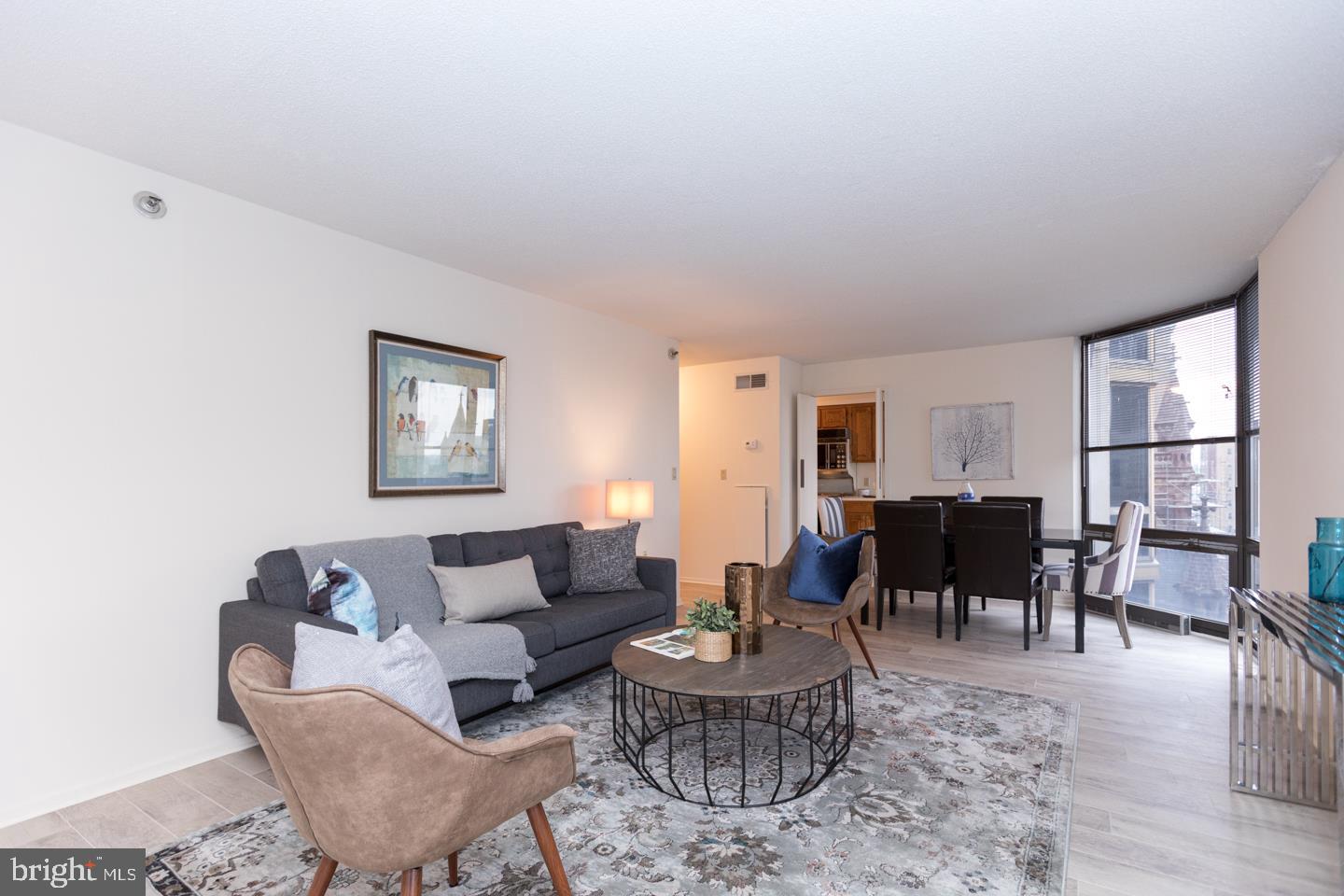 Spacious, light-filled two bedroom, two bathroom with gorgeous city views showcased from bay windows in all rooms! The residence features an eat-in kitchen; excellent closet space throughout; master bedroom with ensuite bath and several wall closets; and second bedroom with access to a full hall bath. Residents of the Wanamaker House enjoy a 24-hour doorman, a seasonal rooftop pool, a fitness center, and a parking garage available for an additional fee (subject to availability).