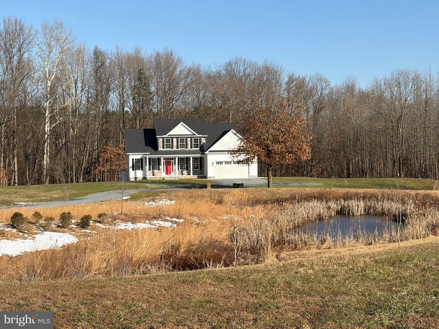 Hard to find small 7 lot community, close to town. Houses are spread apart in estate fashion. This home offers loads of privacy, five bedrooms, 2.5 baths, gourmet kitchen, breakfast nook, open plan (kitchen/family room) and a gas fireplace for comfortable living during cooler temps. Two bedrooms are located on the first floor and one could be useful for that private in-home office. This home features a maintenance free covered porch elevated above the walk-out basement, feels like a tree house. The walkout basement is unfinished and has a half-bath rough-in has been installed. If you are looking for a home with plenty of closet space and storage, look no further, closets are plentiful and amazing. Tiled master bath has soaking tub and separate walk-in shower.  Granite counter and vanity tops throughout. Final inspections have been ordered and quick occupancy available. Listing agent is owner of Weese Development Corporation.